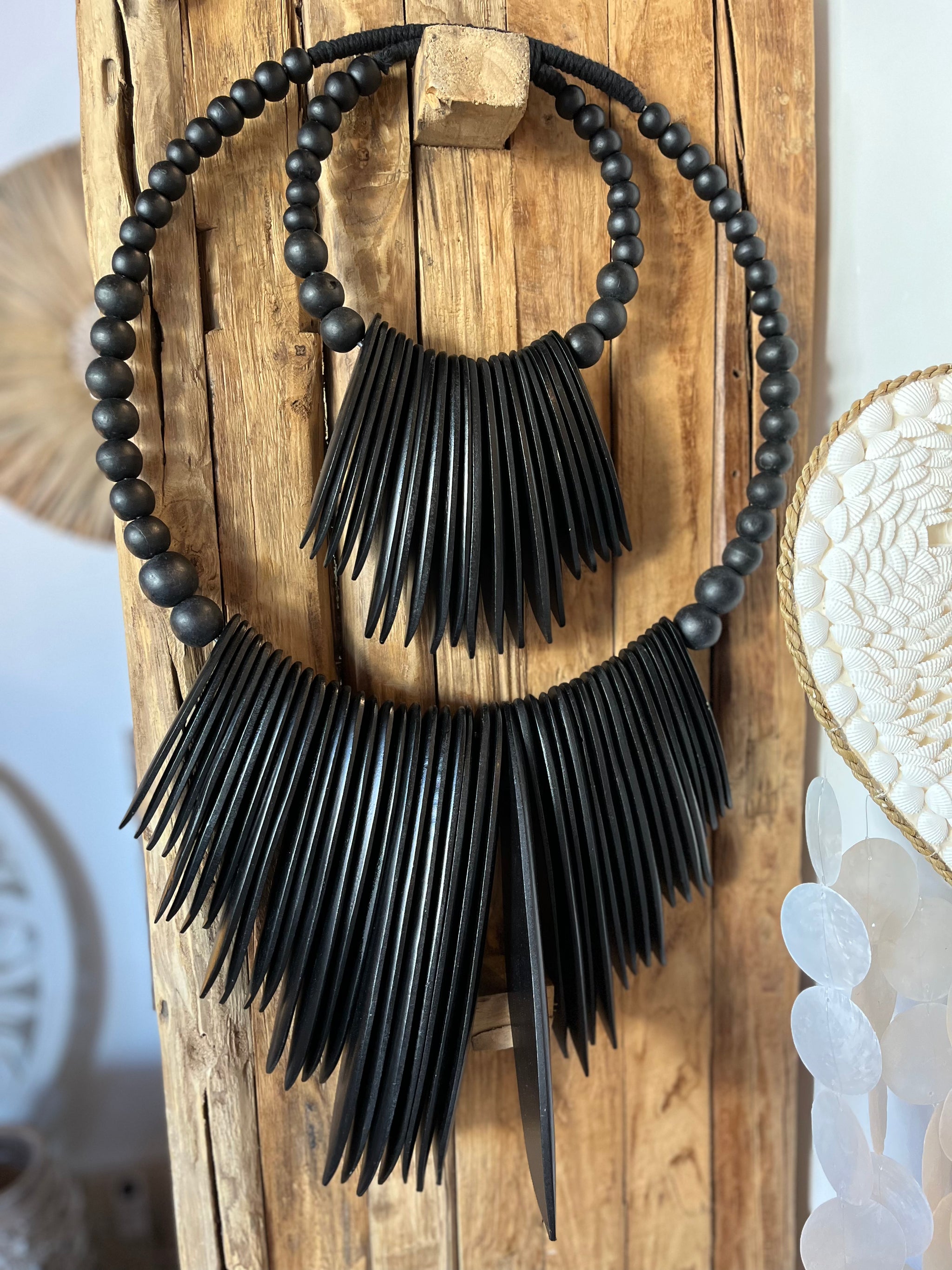 Black 2 tier wall hanging. Timber. - Bali Beach Beyond