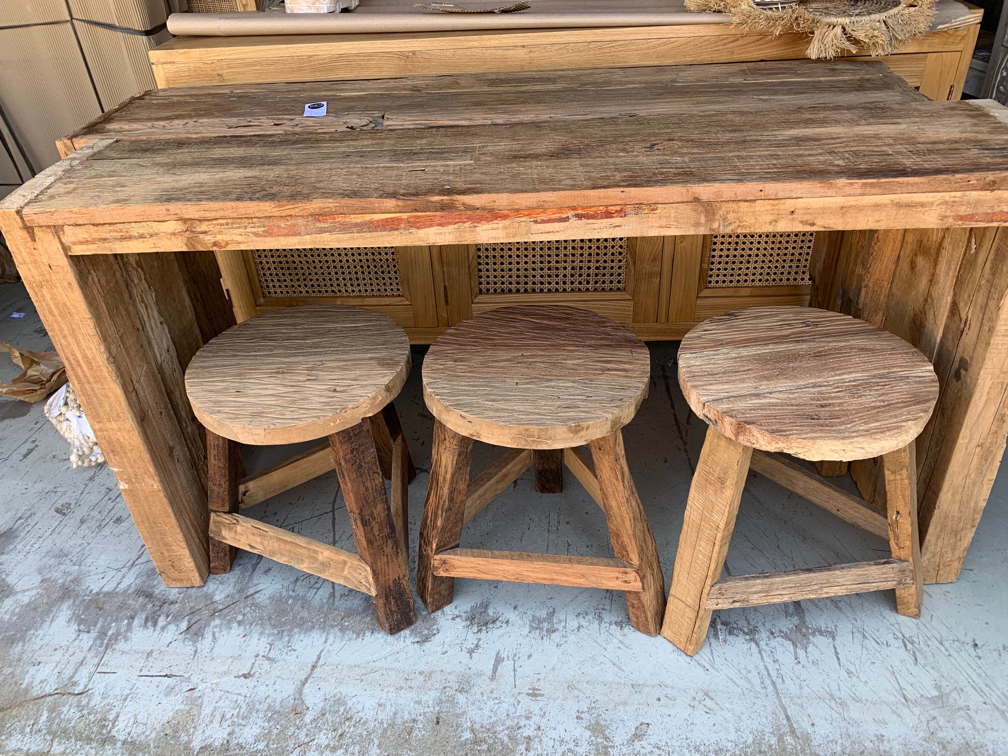 Solid recycled timber round stool.