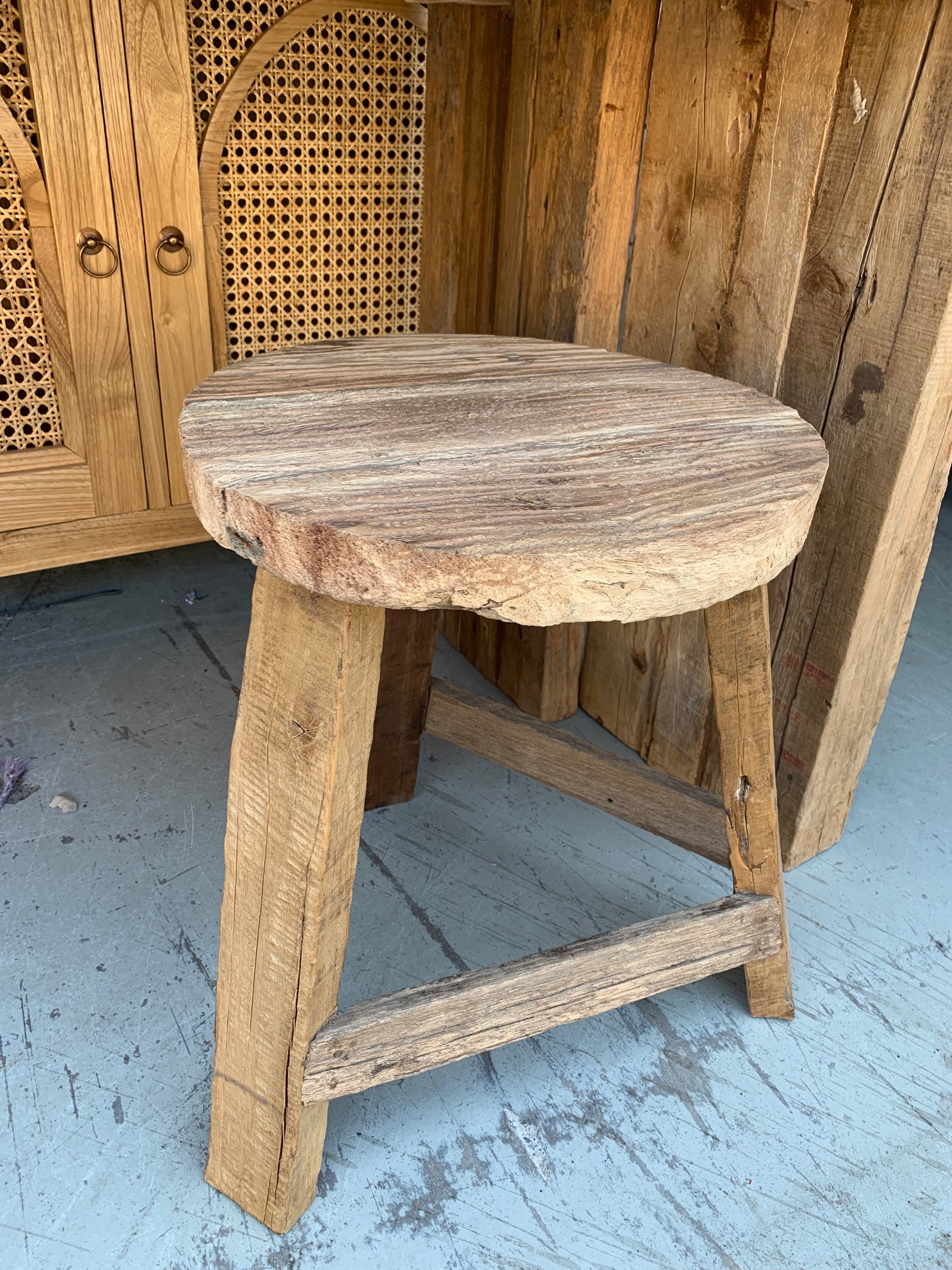 Solid recycled timber round stool.
