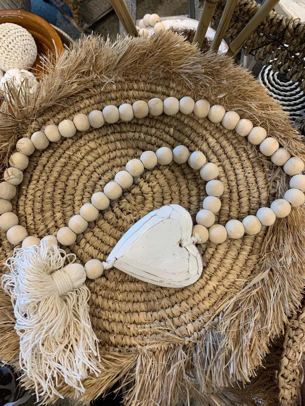 Natural beads and timber heart decoration. - Bali Beach Beyond