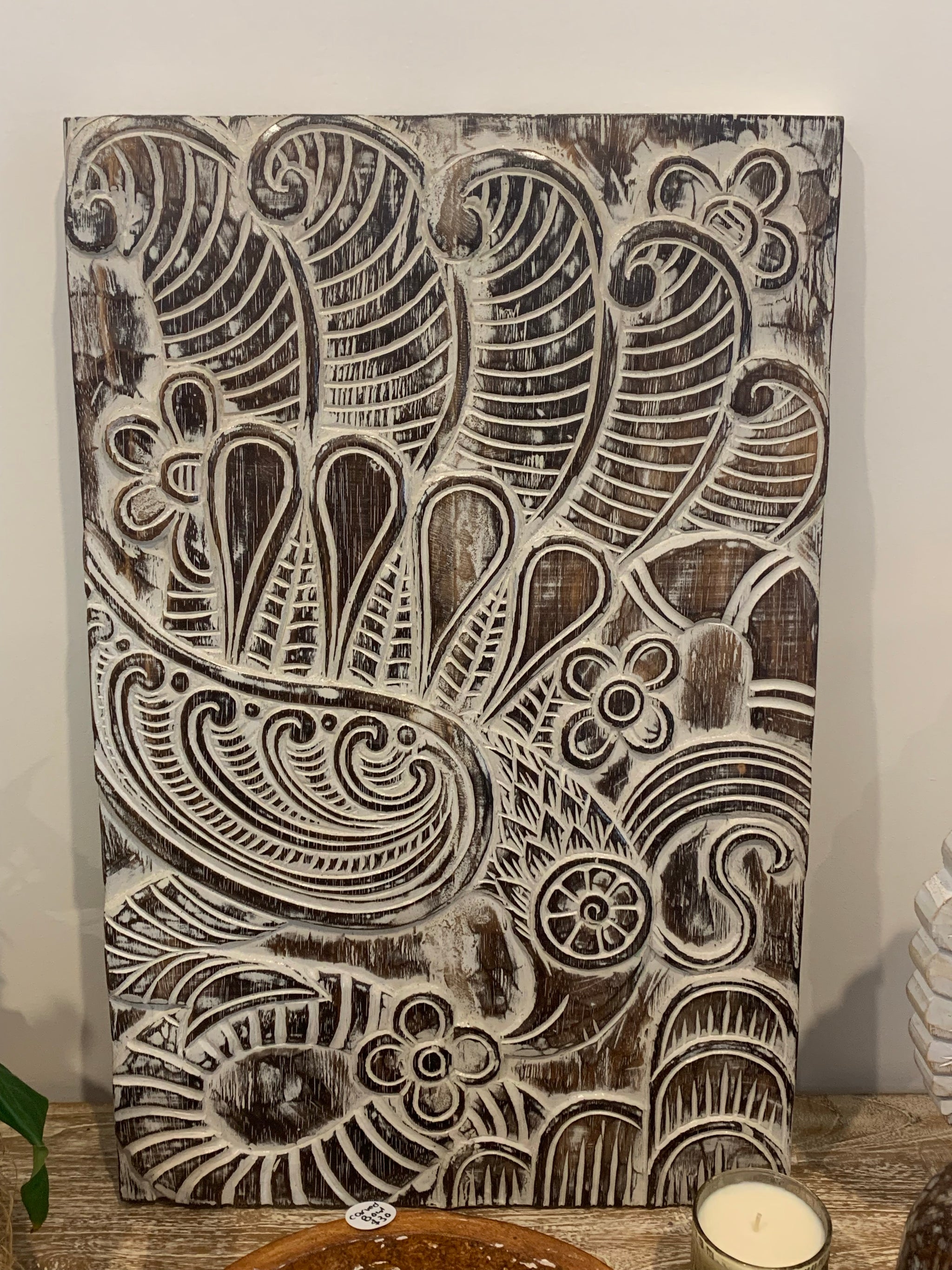 Handcarved timber panel wall hanging.