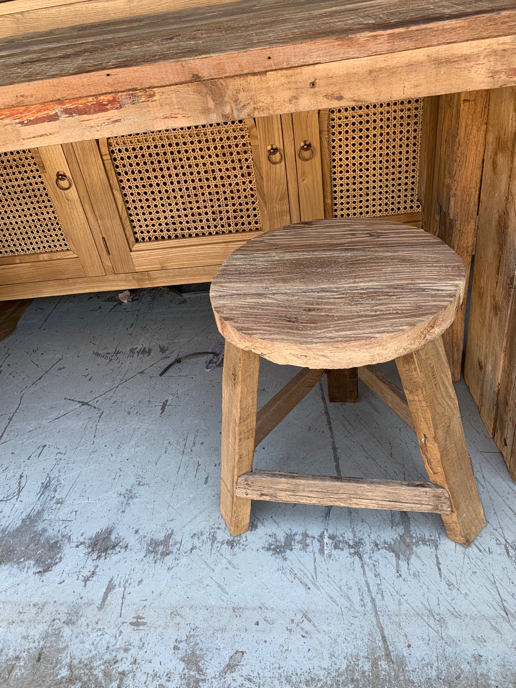 Solid recycled timber round stool.