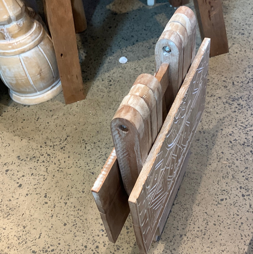Folding timber carved design table. Natural finish.