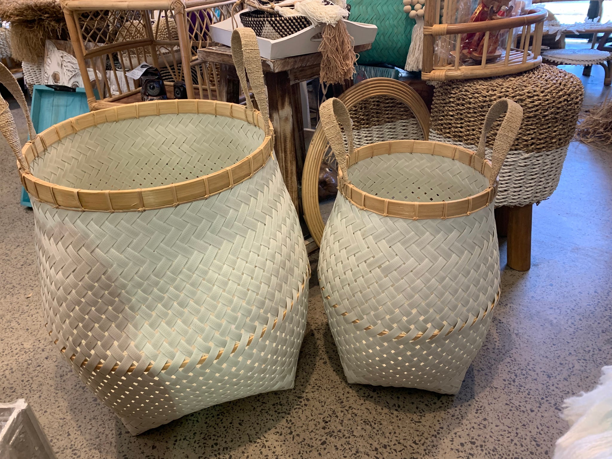 Set 2 White basket large and medium with natural detail. Usually $195