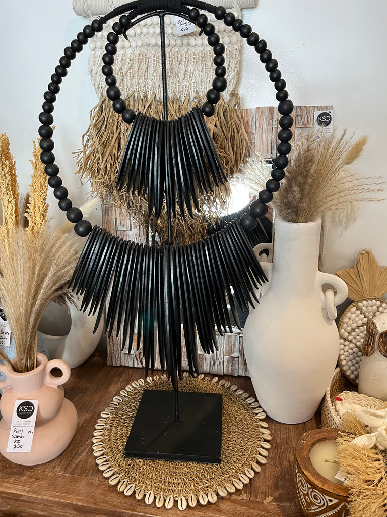 Black timber decoration on stand – Bali Beach Beyond