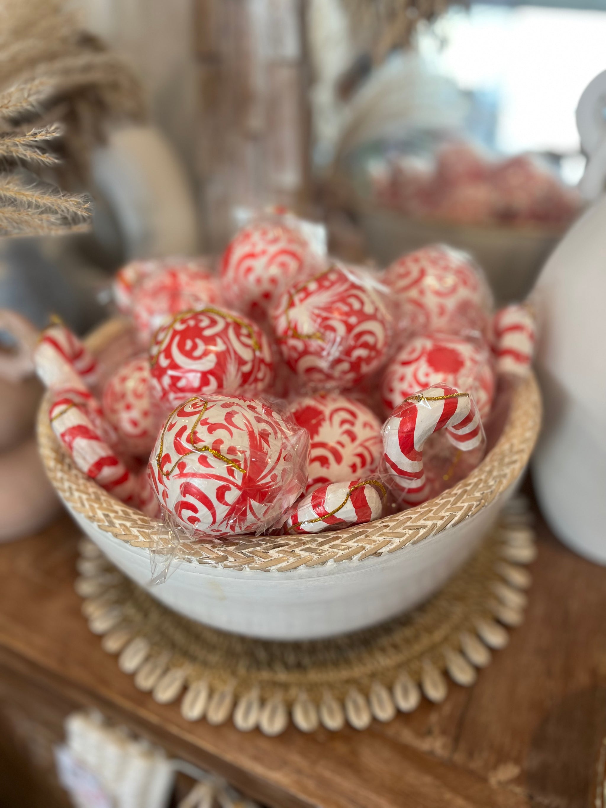 Handcrafted and handpainted timber Christmas candy cane decoration. Red and white.