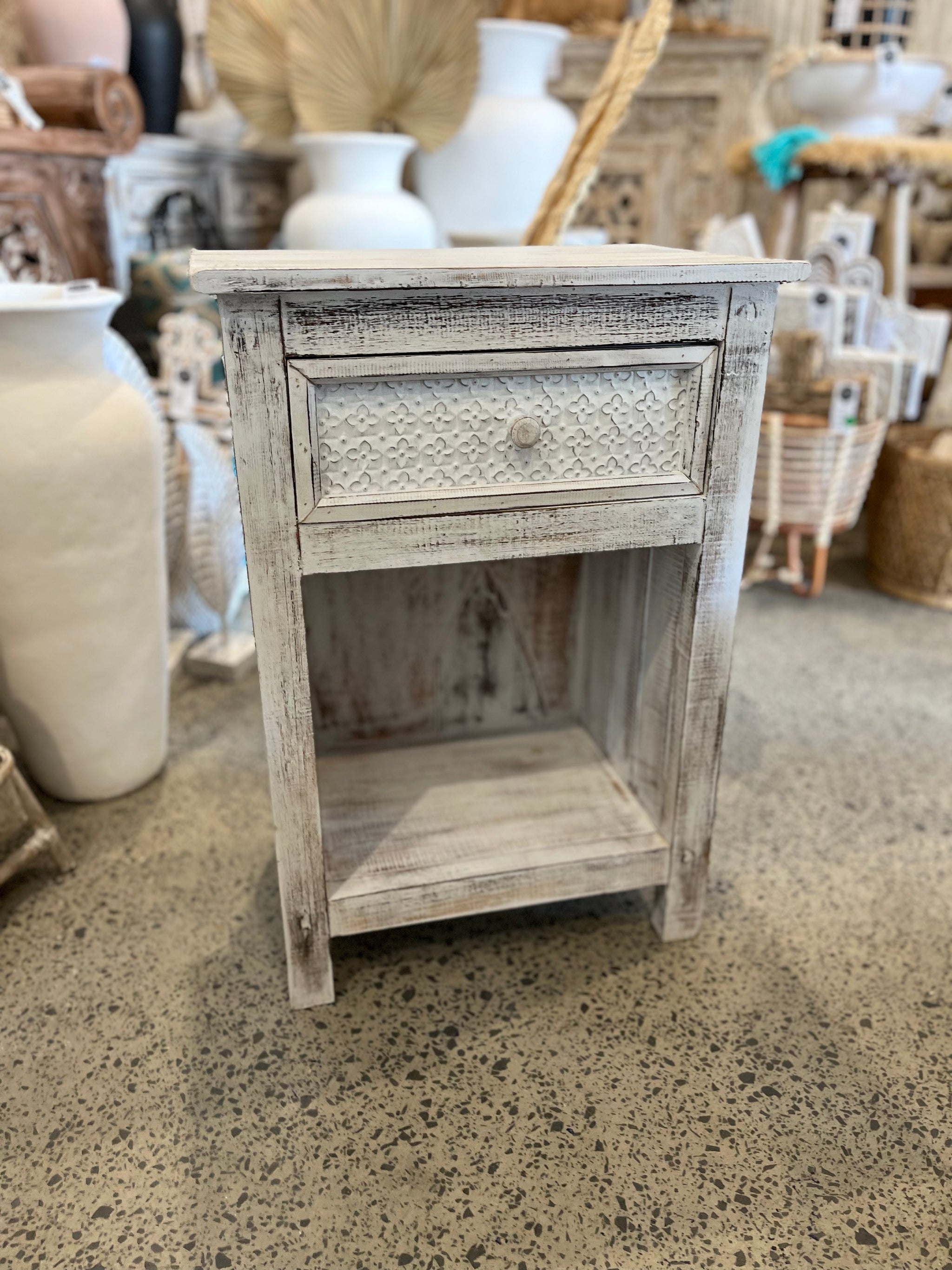 Rustic white timber bedside with pressed metal detailed drawer