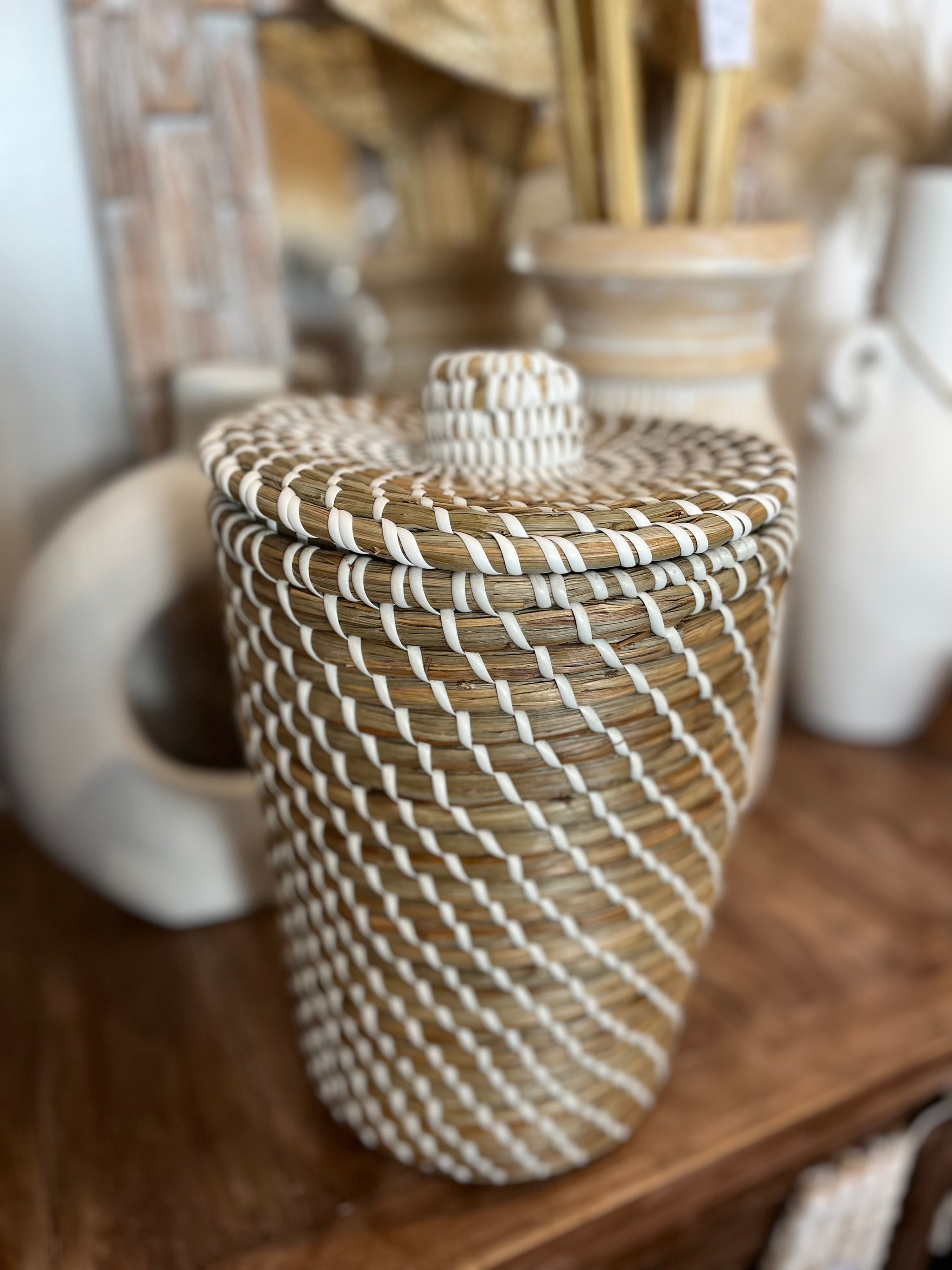 Woven basket with lid.