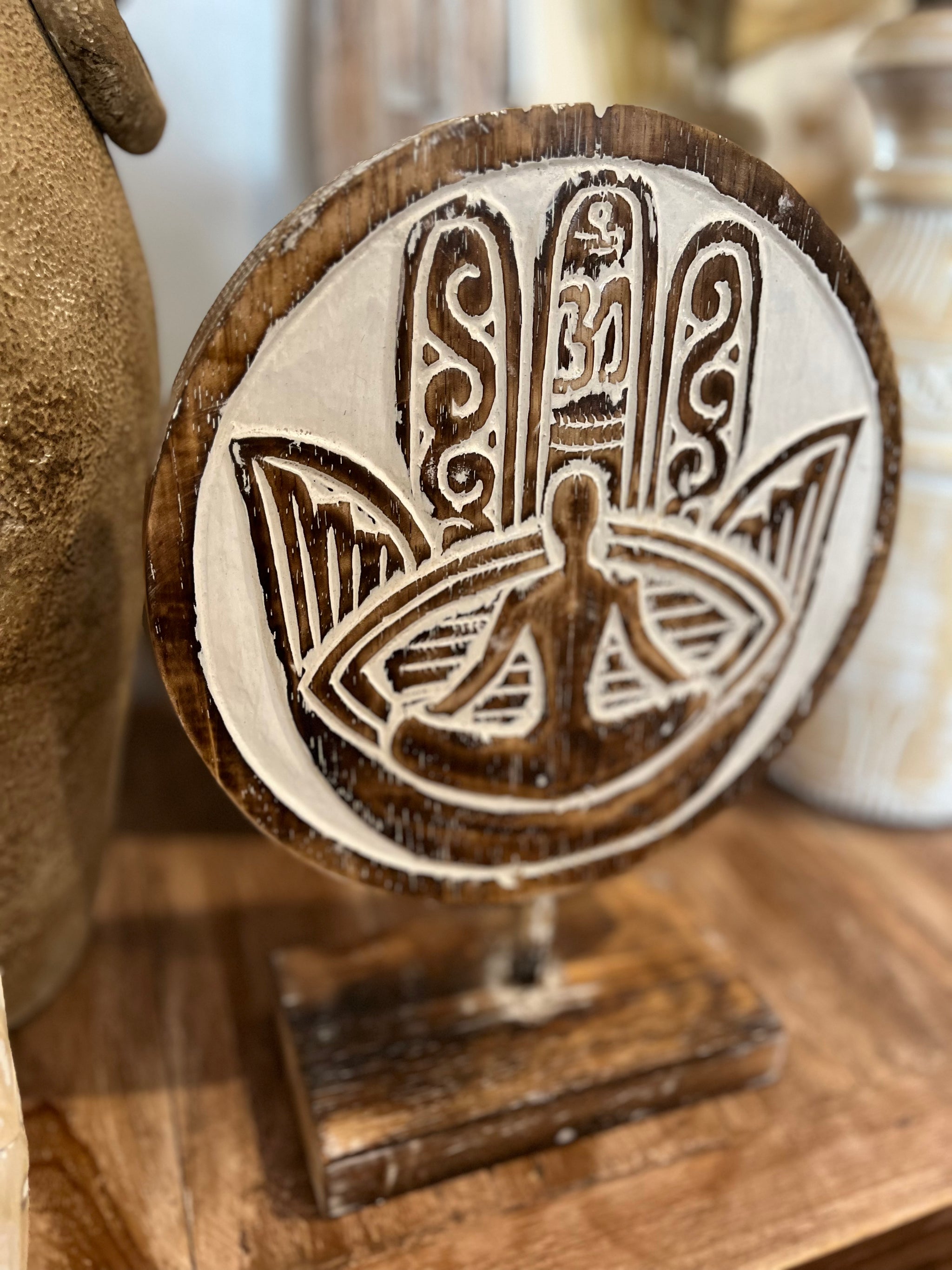 Set of 3 hamsa hand / yoga on stands. Timber