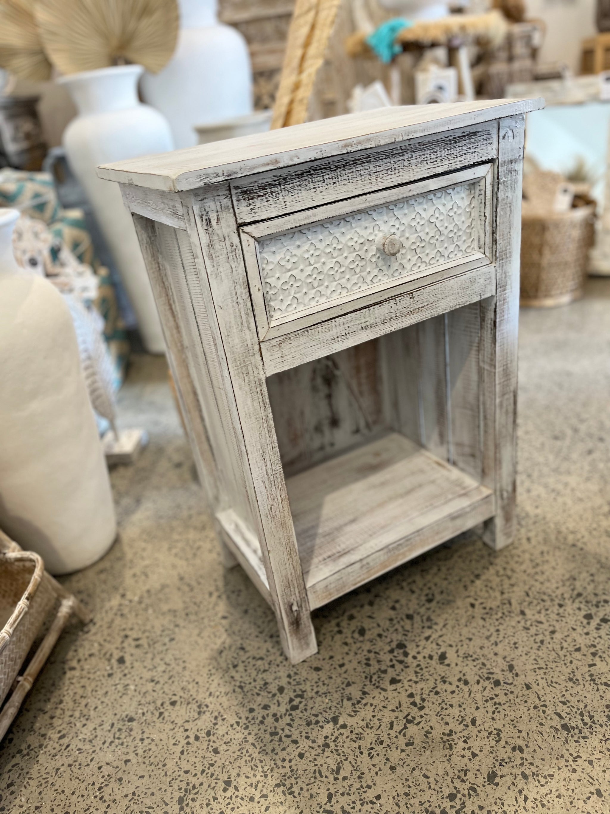 Rustic white timber bedside with pressed metal detailed drawer