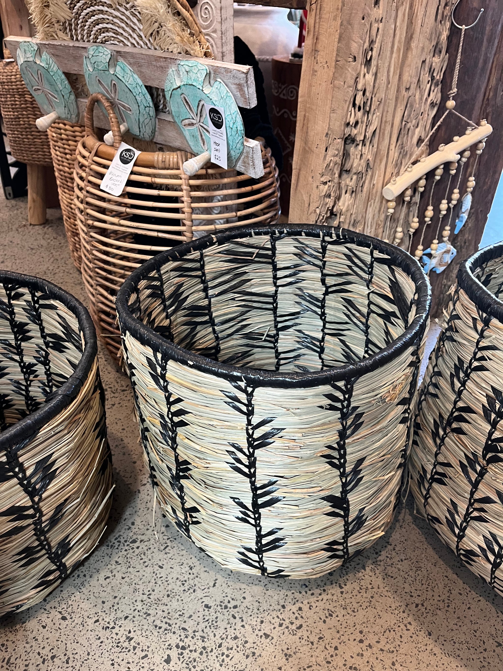 Set 3 woven baskets with natural/ black detail.