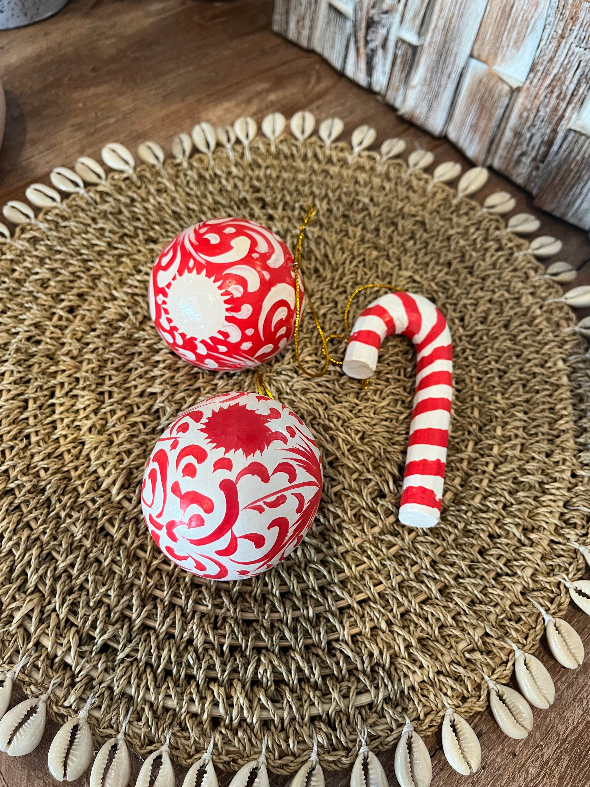 Handcrafted and handpainted timber Christmas candy cane decoration. Red and white.