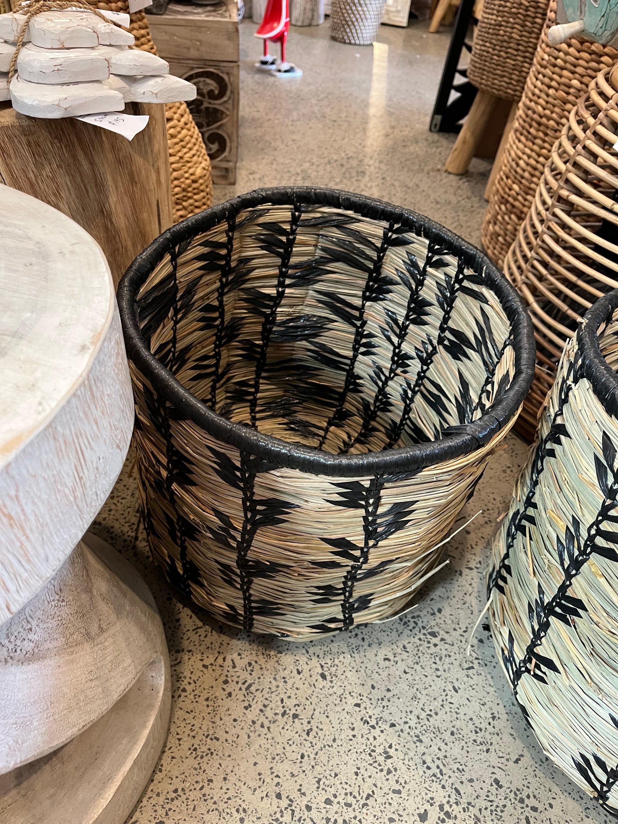 Set 3 woven baskets with natural/ black detail.