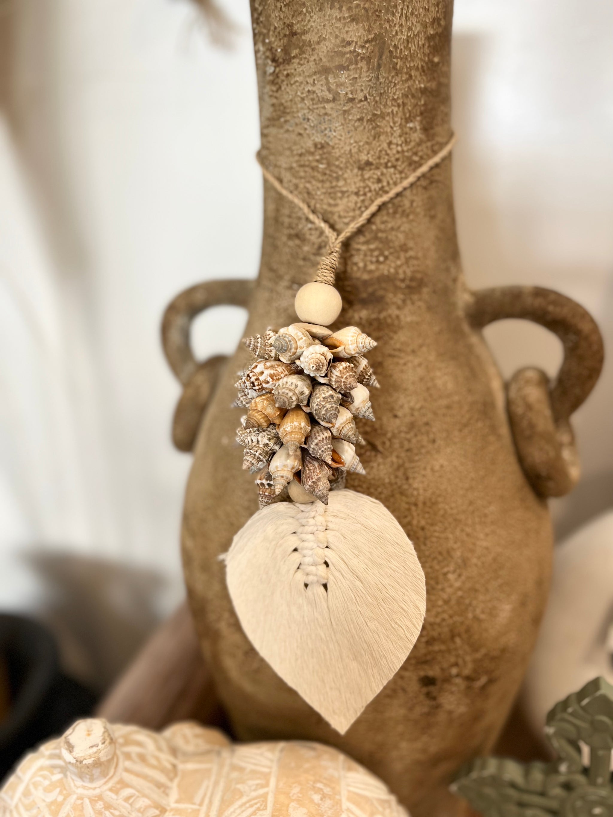 Natural leaf and pointy shell hanging