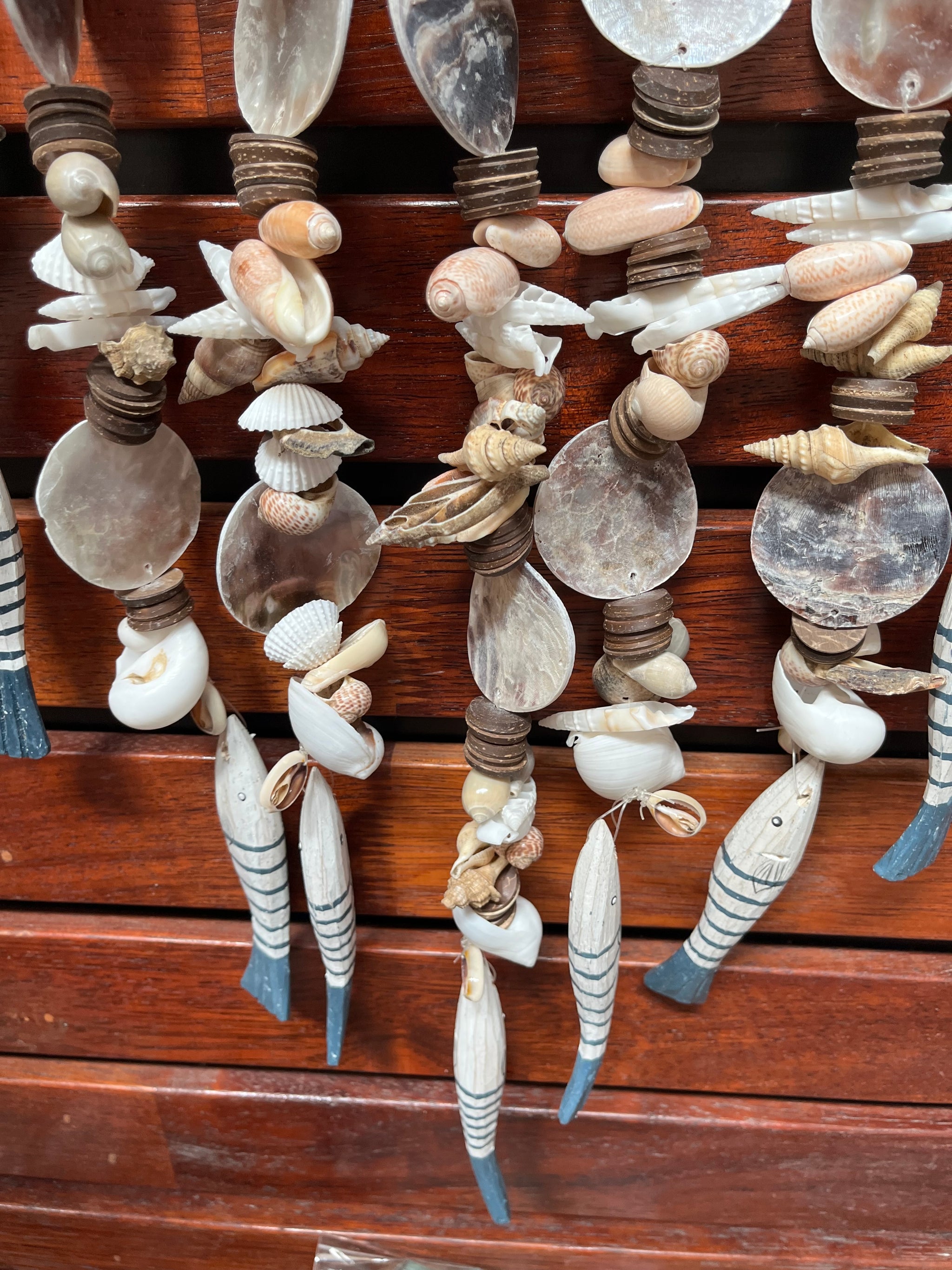 Timber fish, shell and wood wall hanging