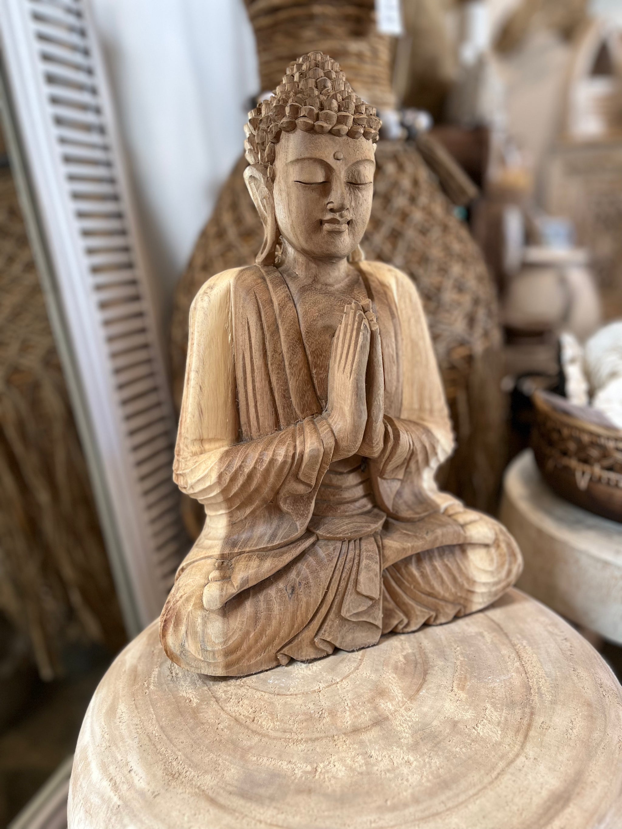 Solid timber praying Buddha. 42cm