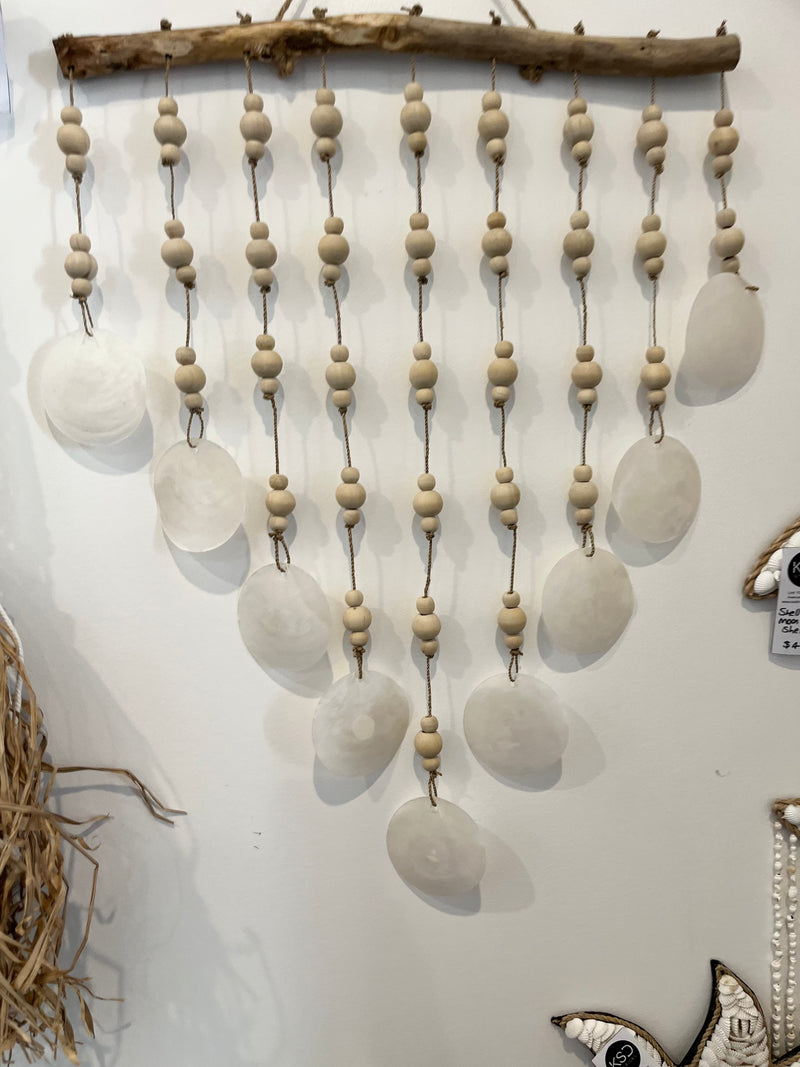 Clear shell and natural bead wall hanging