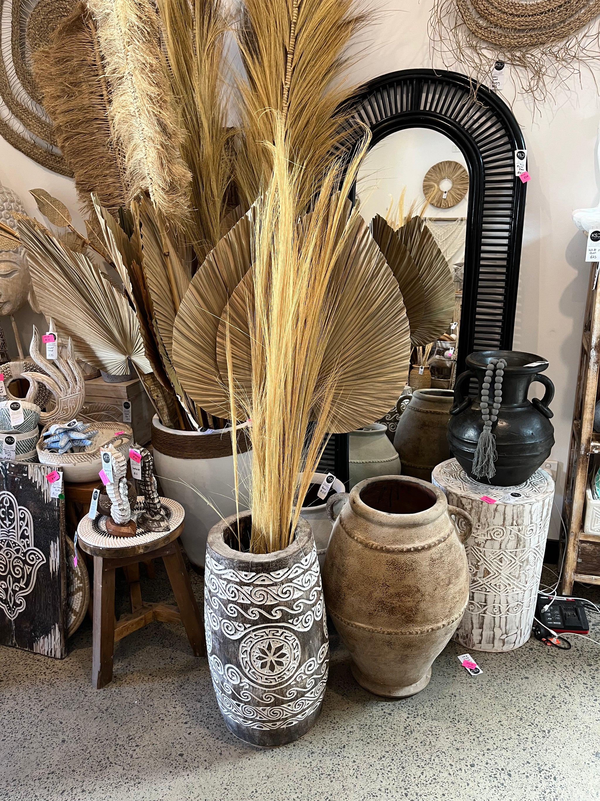 Handcarved timber palm vase.