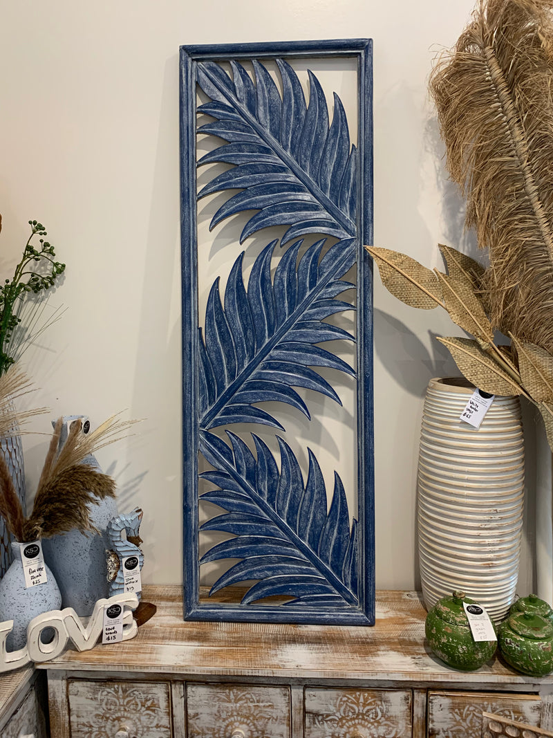 Blue leaf wall hanging.