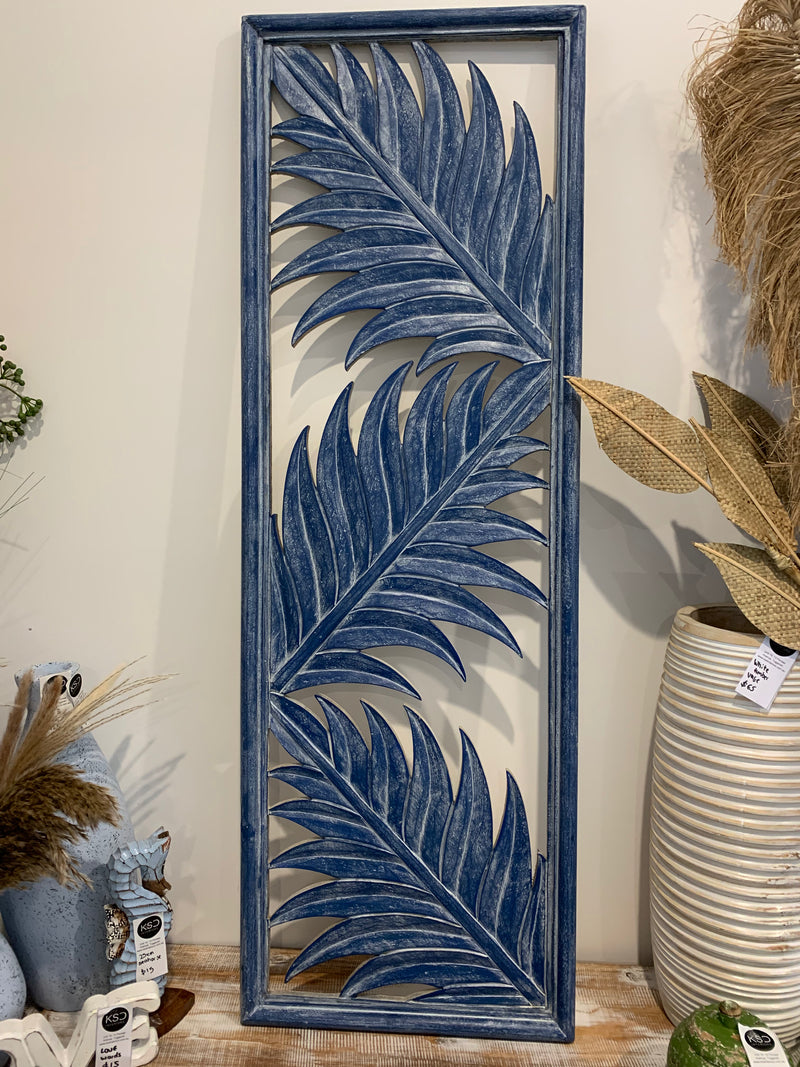 Blue leaf wall hanging.