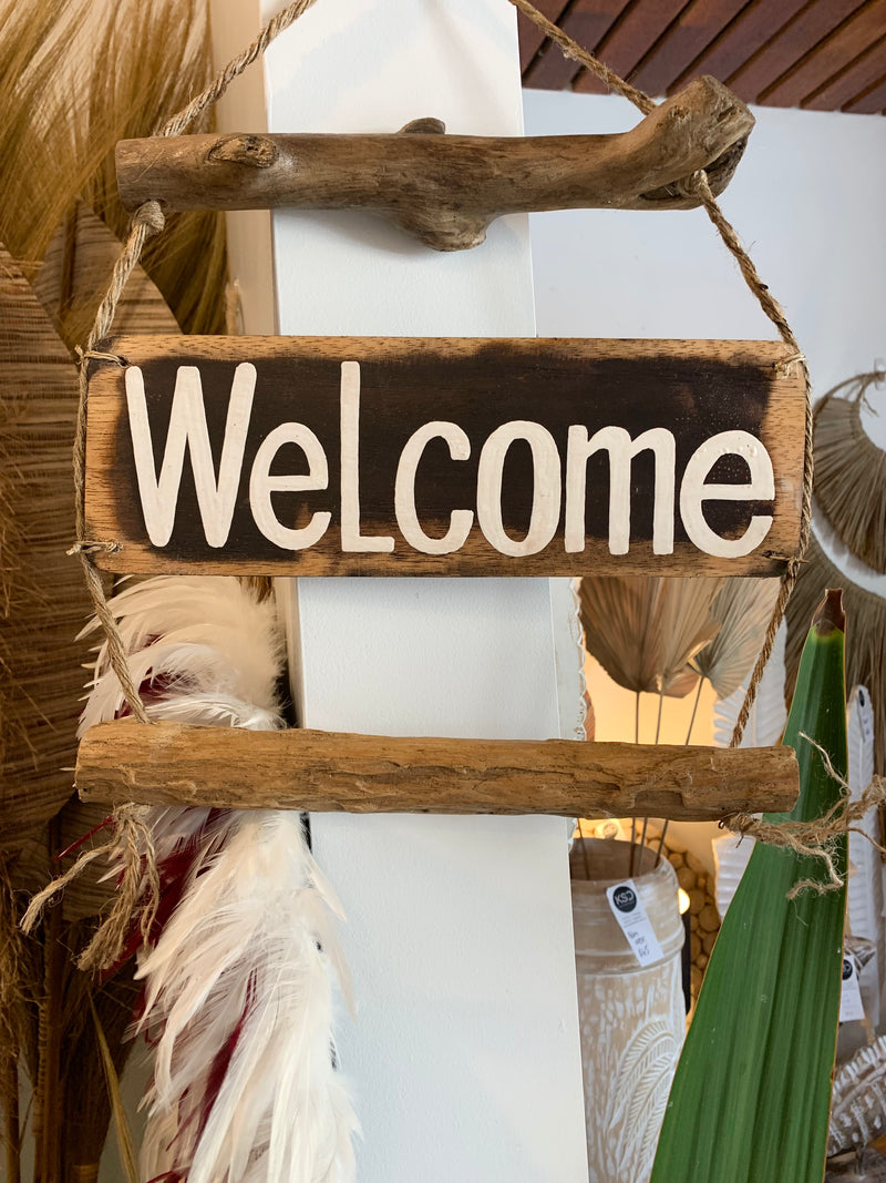 Welcome timber hanging sign.