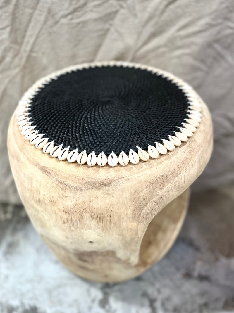 Black rattan placemat with cowrie shells