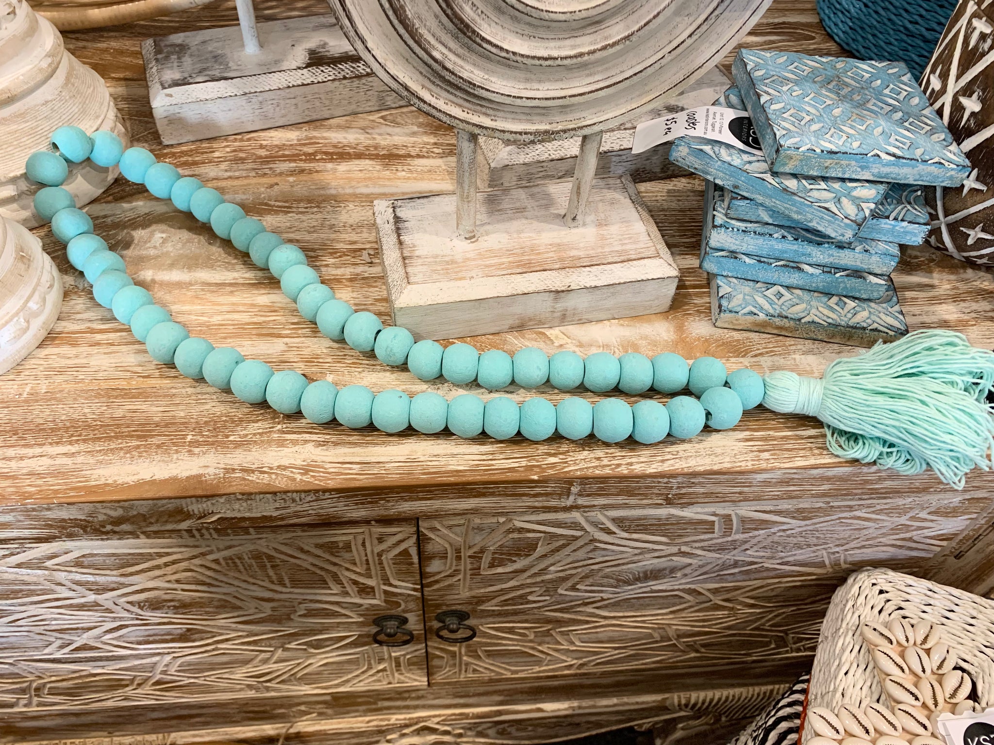 Light mint green bead necklace / tassel decoration. 60cm approx