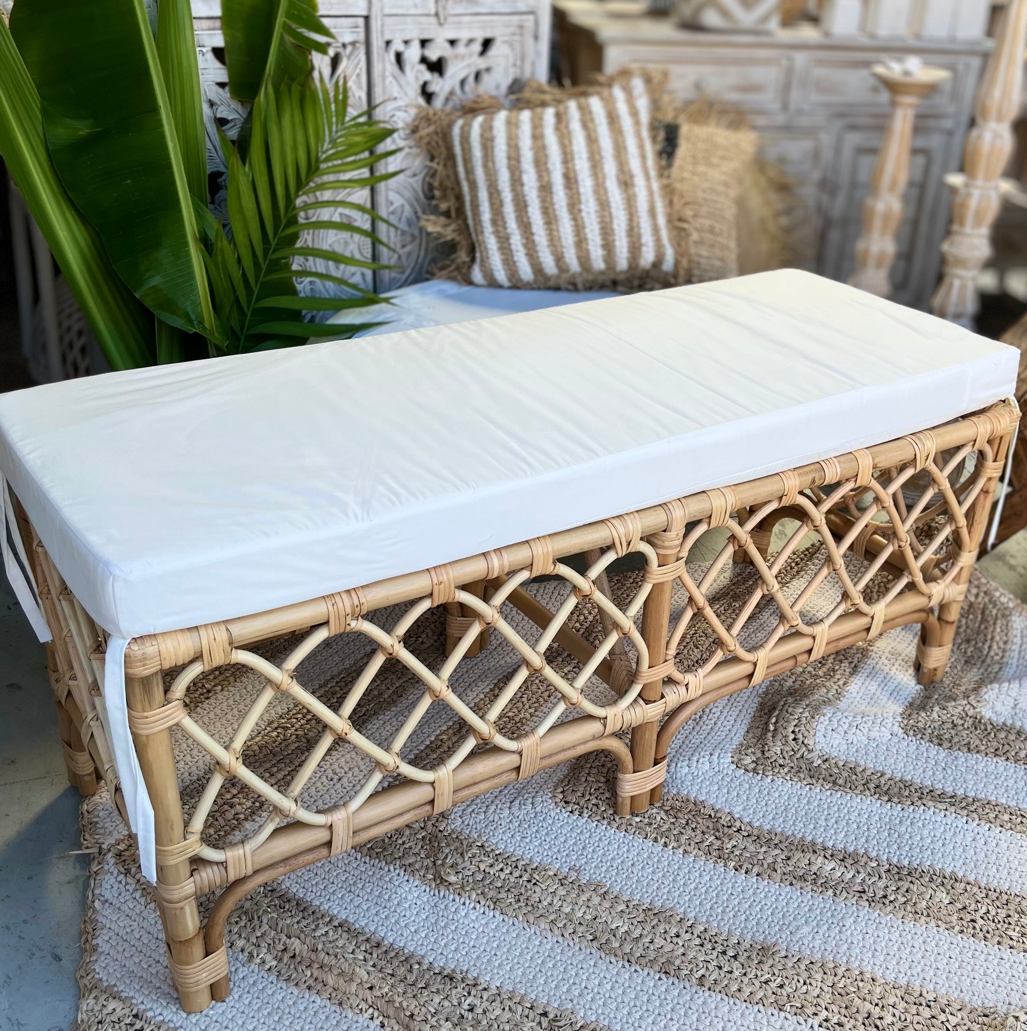 Rattan bench seat with cushion