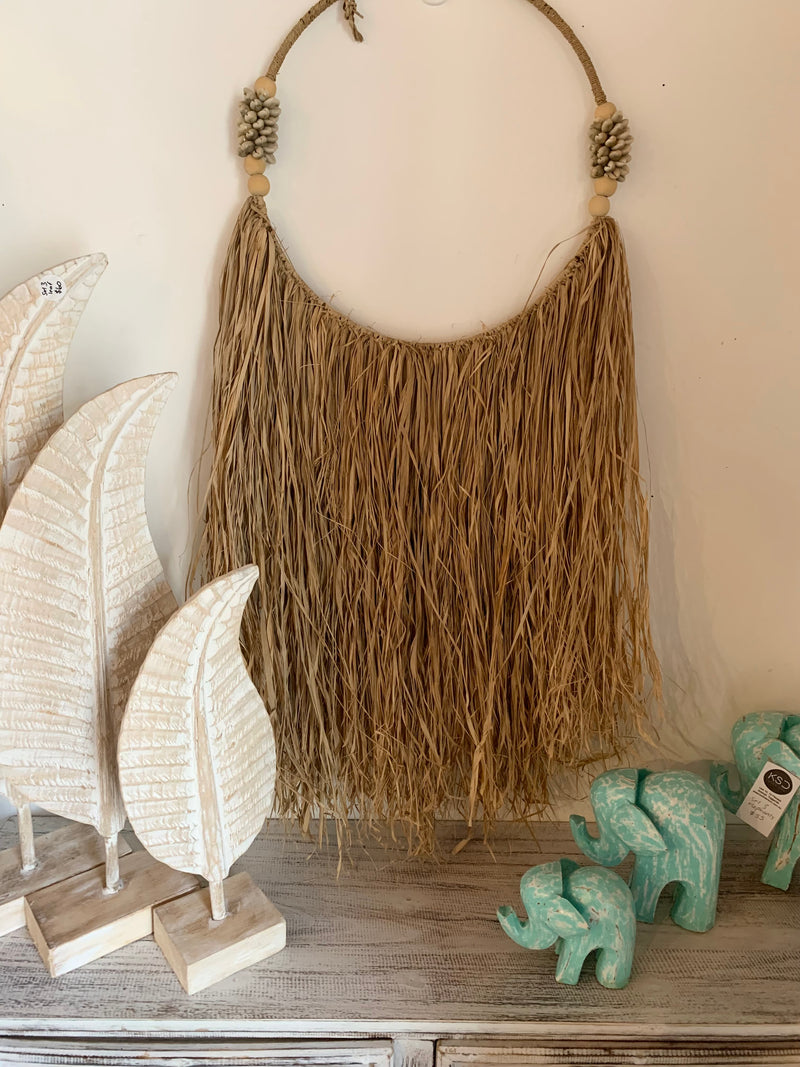 Raffia and shell wall hanging. 40cm