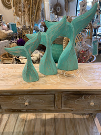 Rustic turquoise whale tails