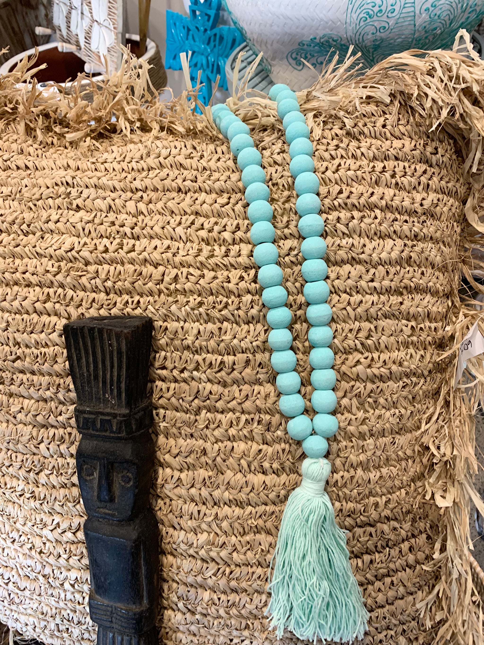 Light mint green bead necklace / tassel decoration. 60cm approx