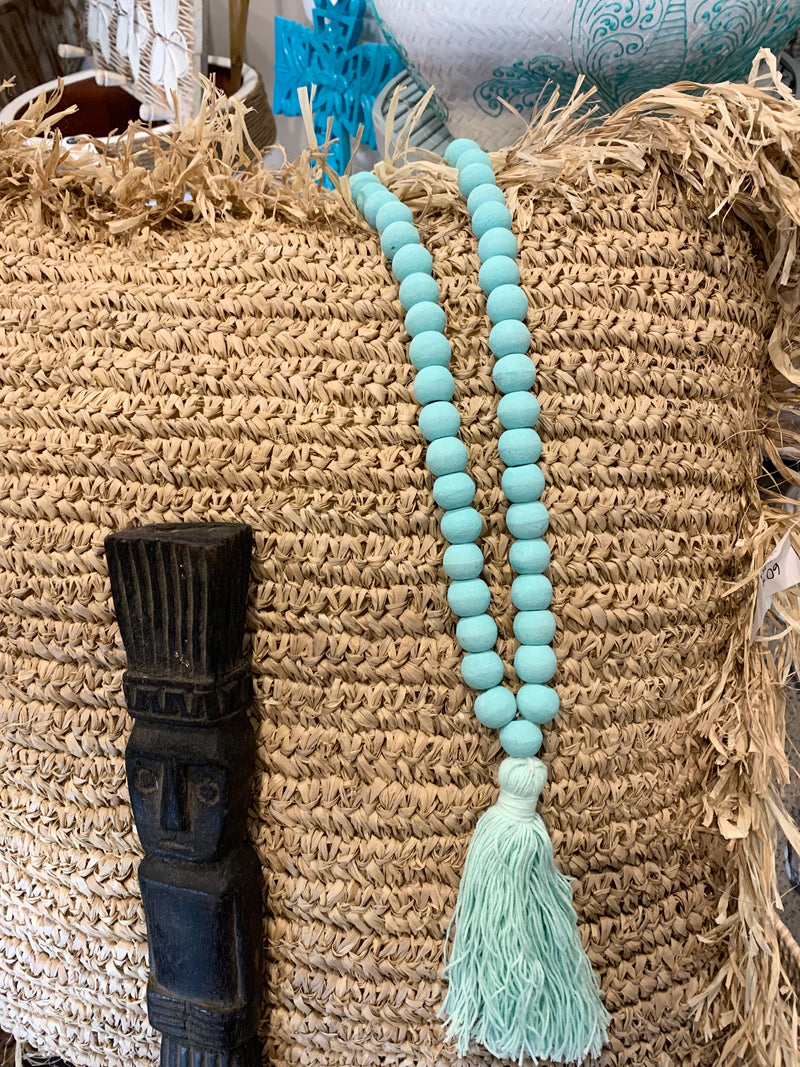 Light mint green bead necklace / tassel decoration. 60cm approx