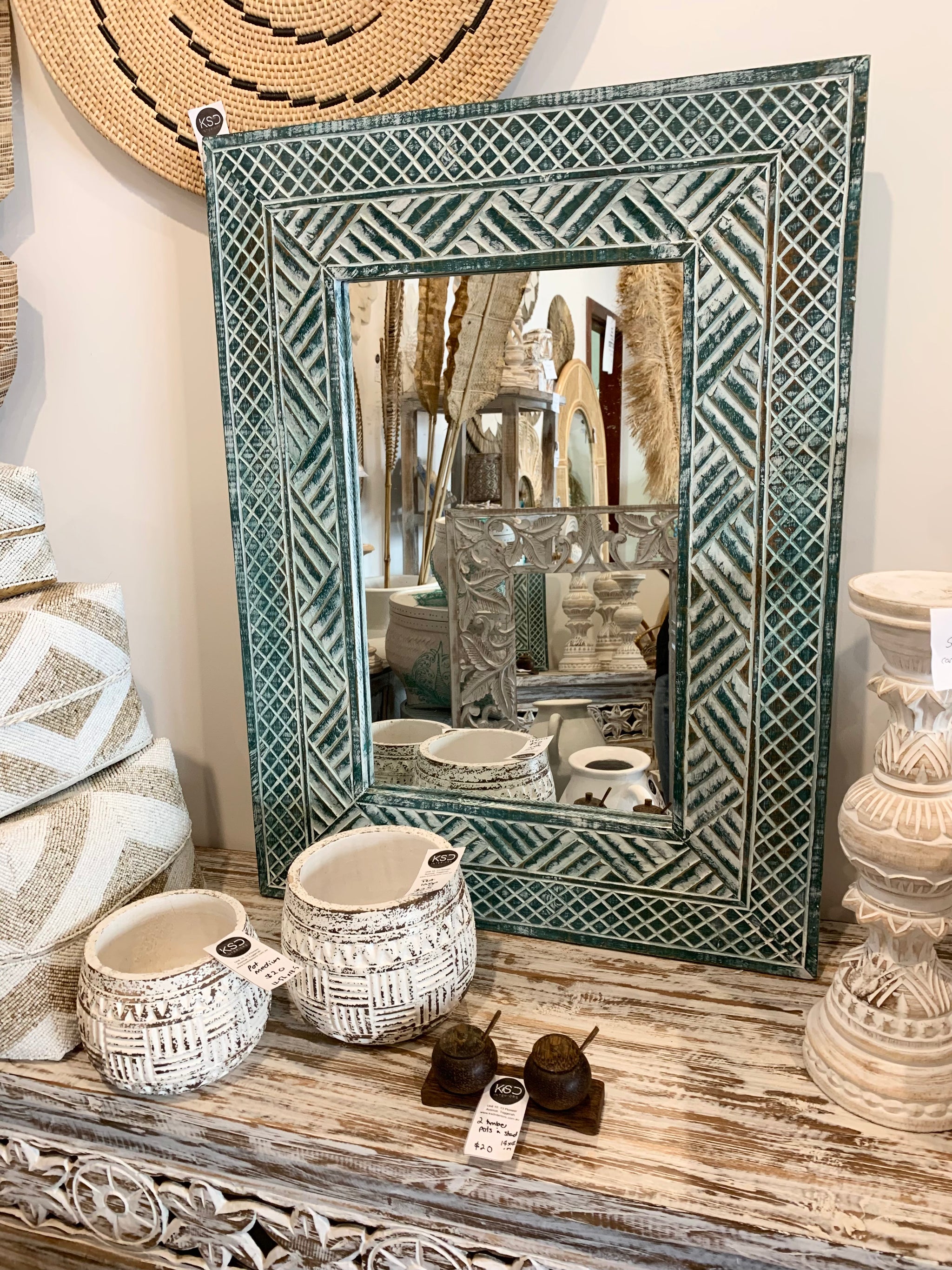 Green carved timber mirror