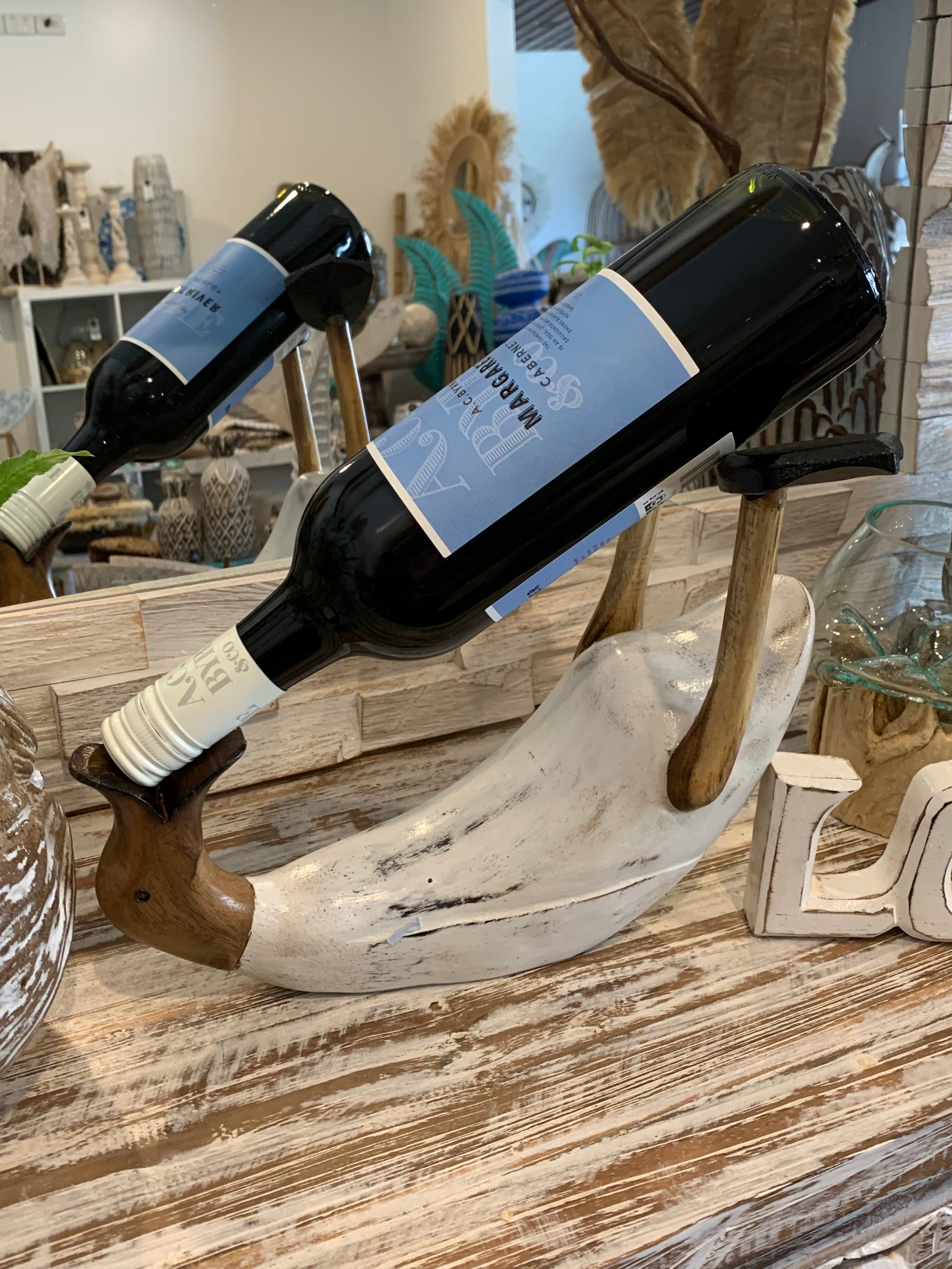 White timber duck wine holder. - Bali Beach Beyond