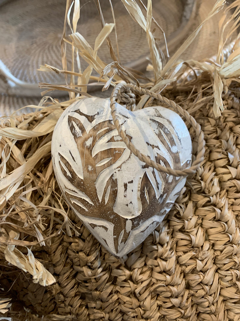 Carved timber heart hanging.