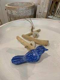 Timber bird hanging decoration. Blue