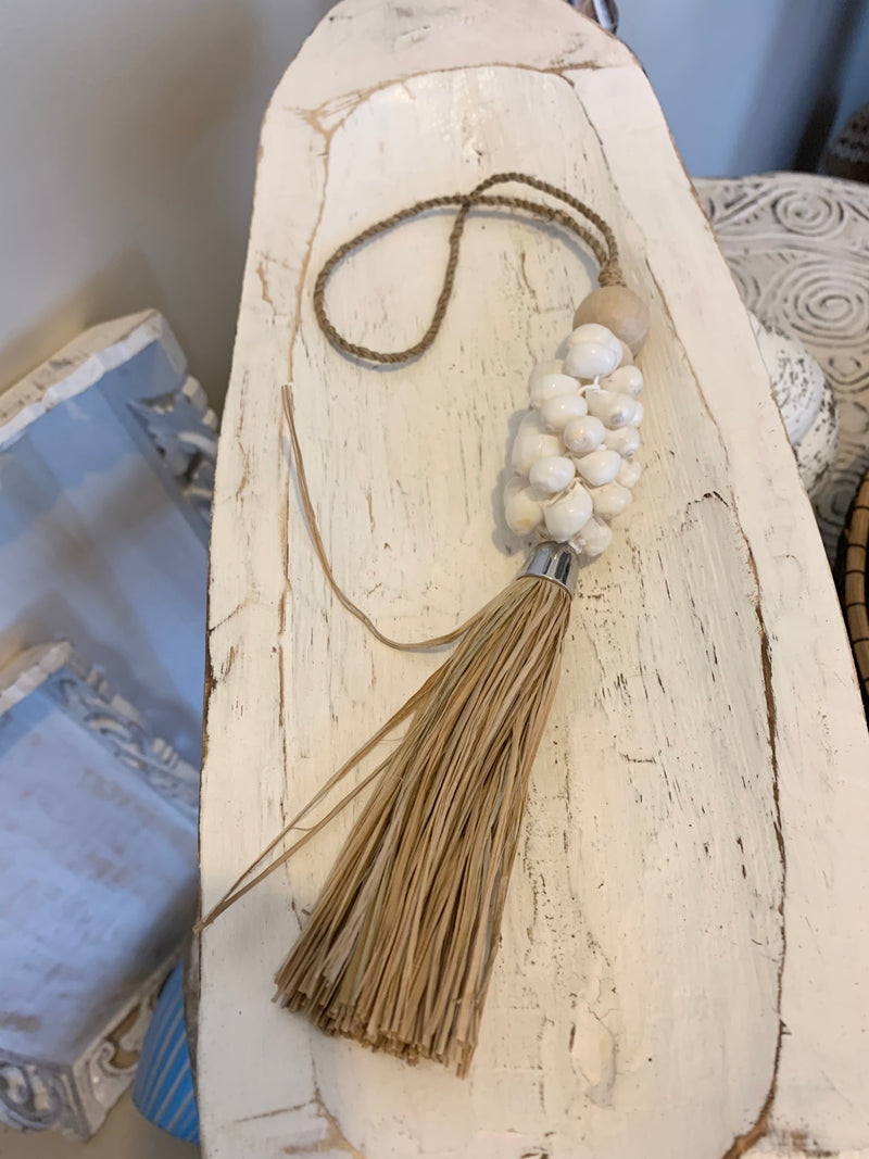 Seagrass and shell hanging