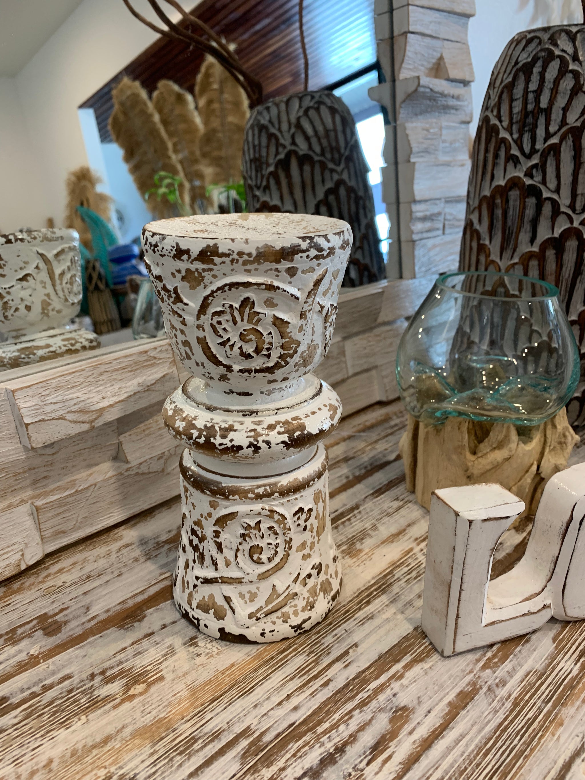 Rustic white candle holder.