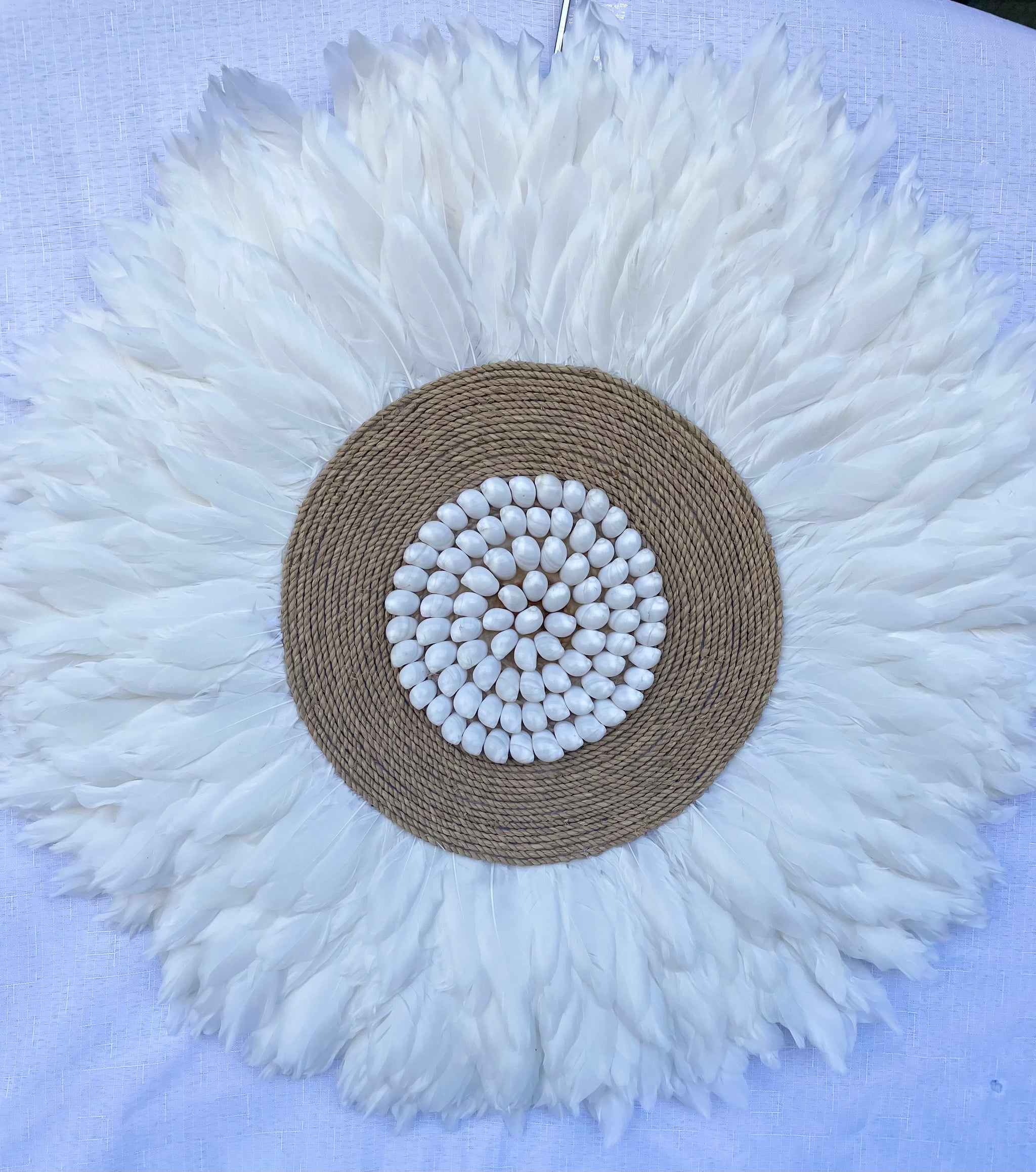 White feather juju with jute and white shell detail