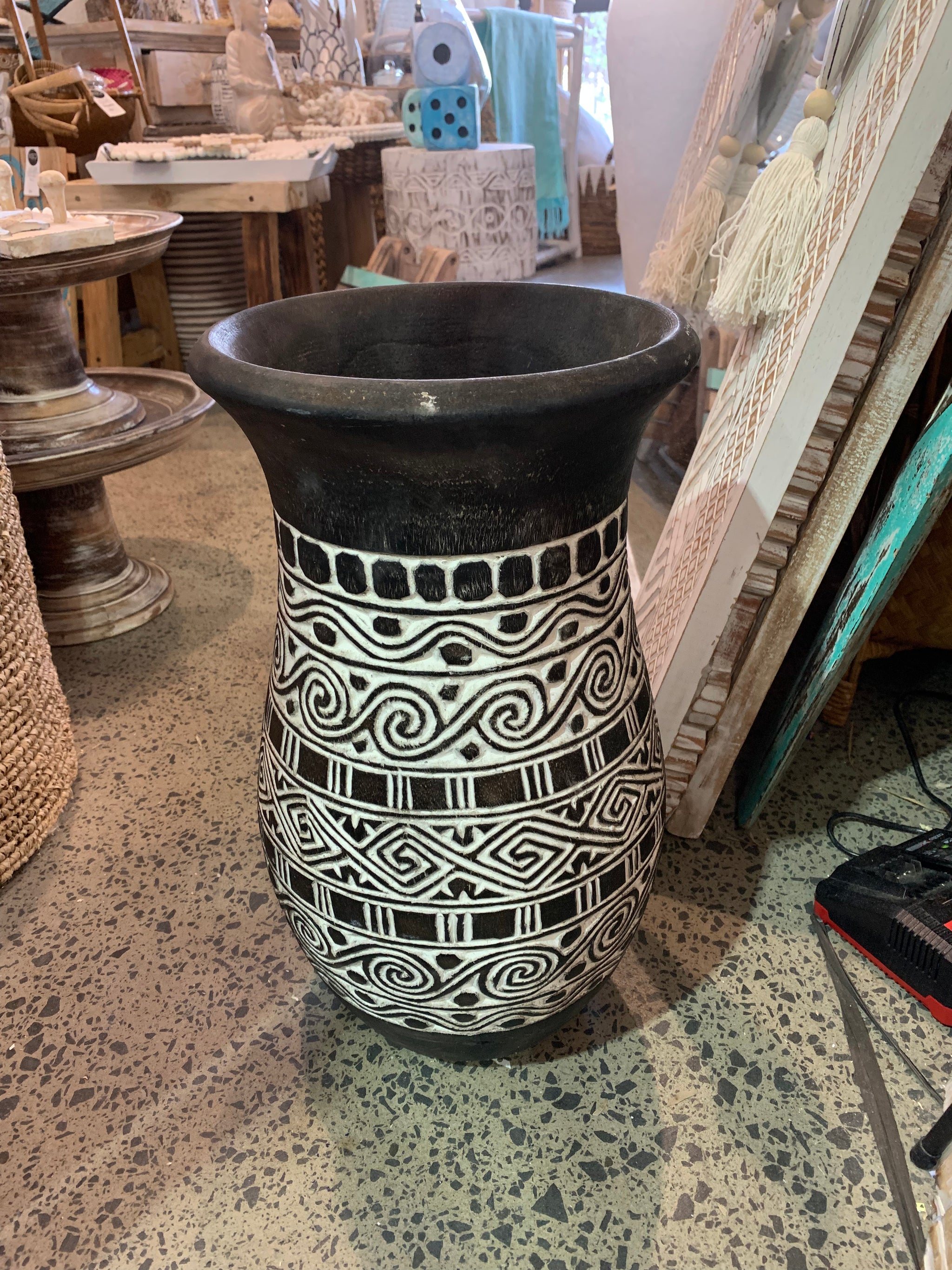 Black handcarved palm vase.