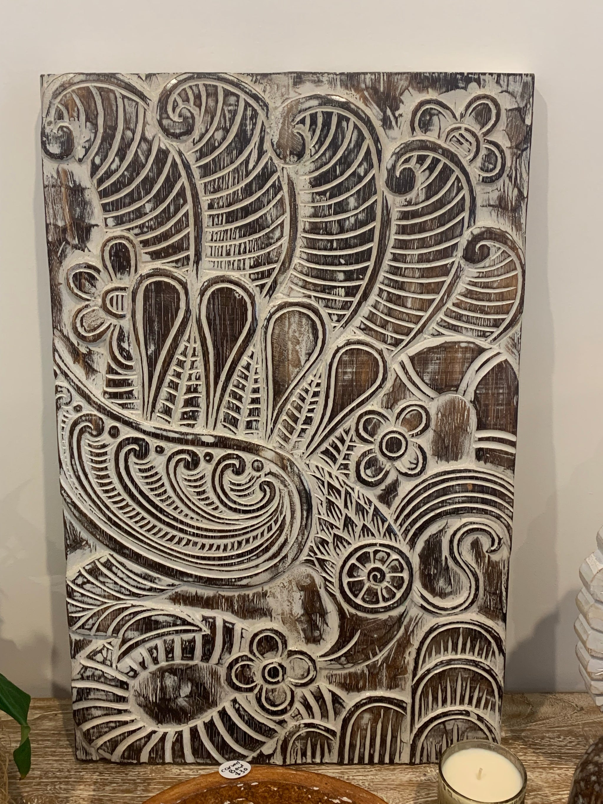 Handcarved timber panel wall hanging.