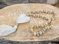 Natural beads and timber heart decoration. Small and large beads.