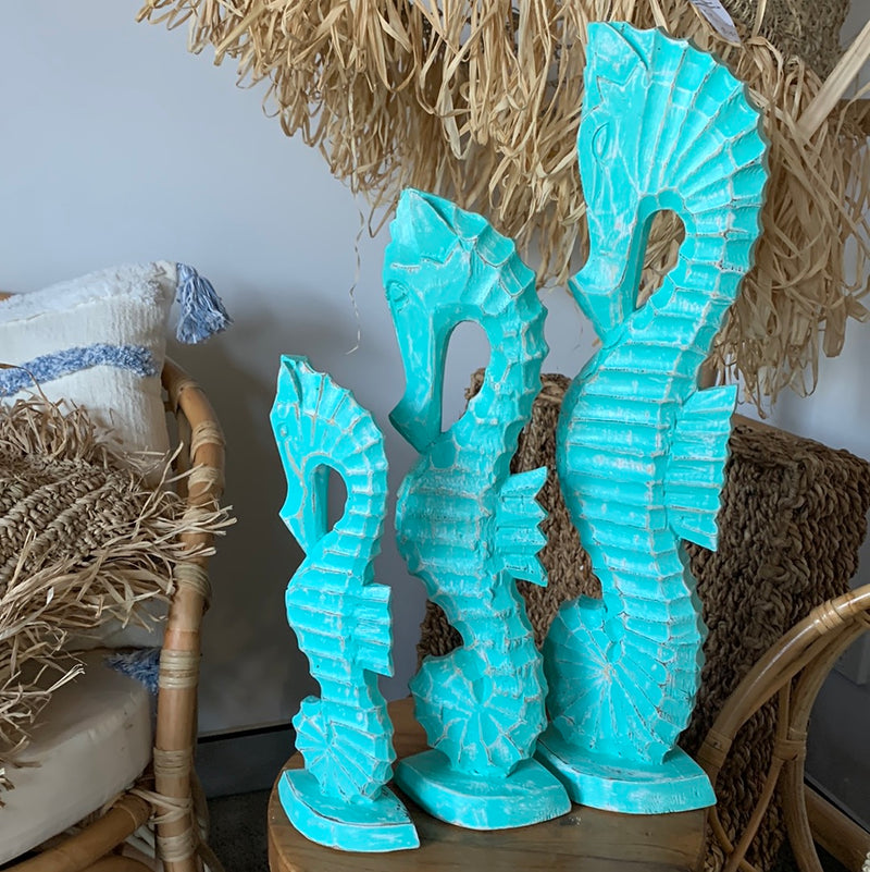 Handcrafted set of 3 timber seahorse. Turquoise