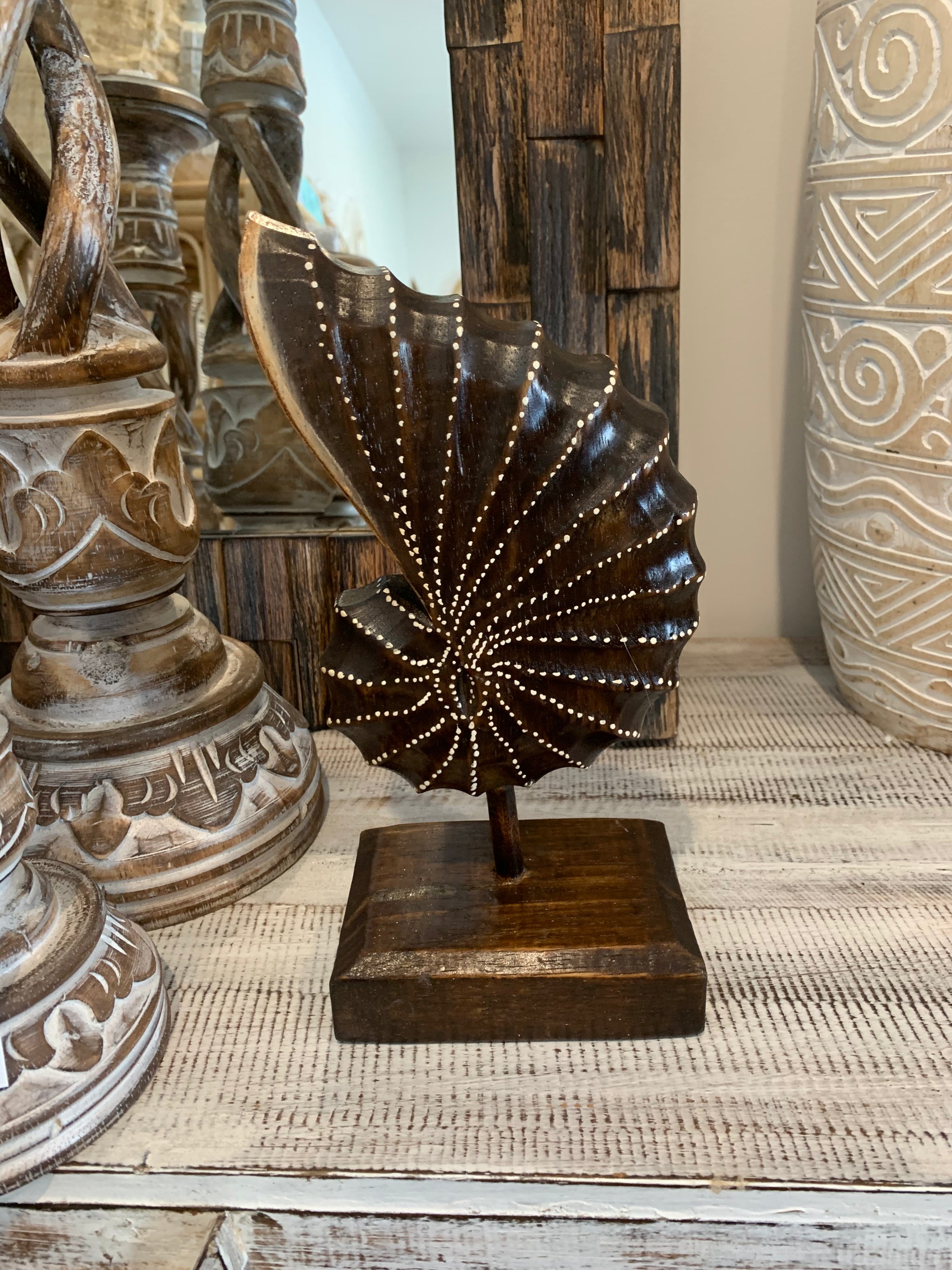 Carved timber shell on stand. Brown. Design 2. S