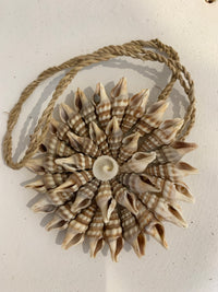 Brown shell decoration. 8cm