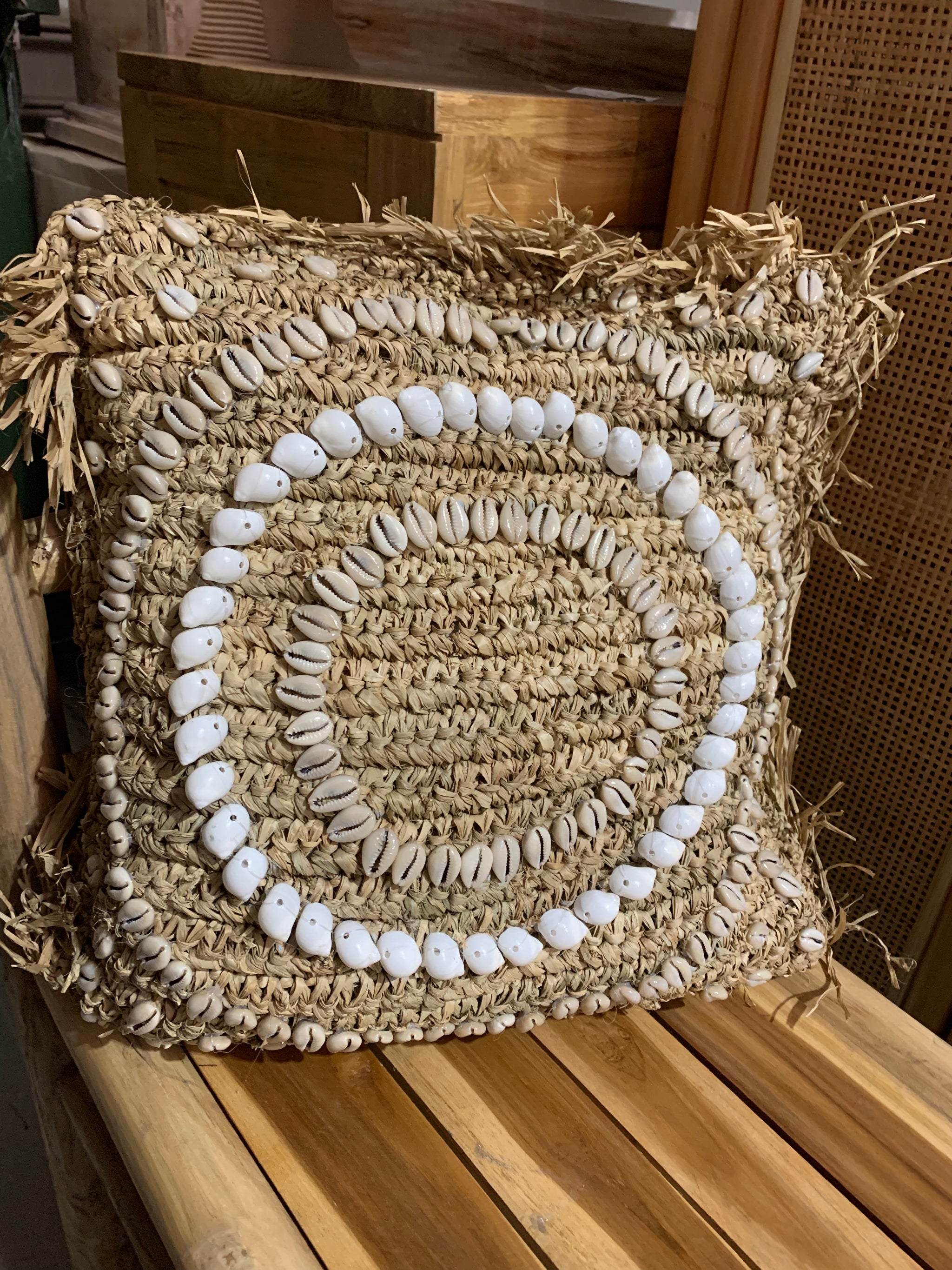 Square raffia cushion and insert with shell design