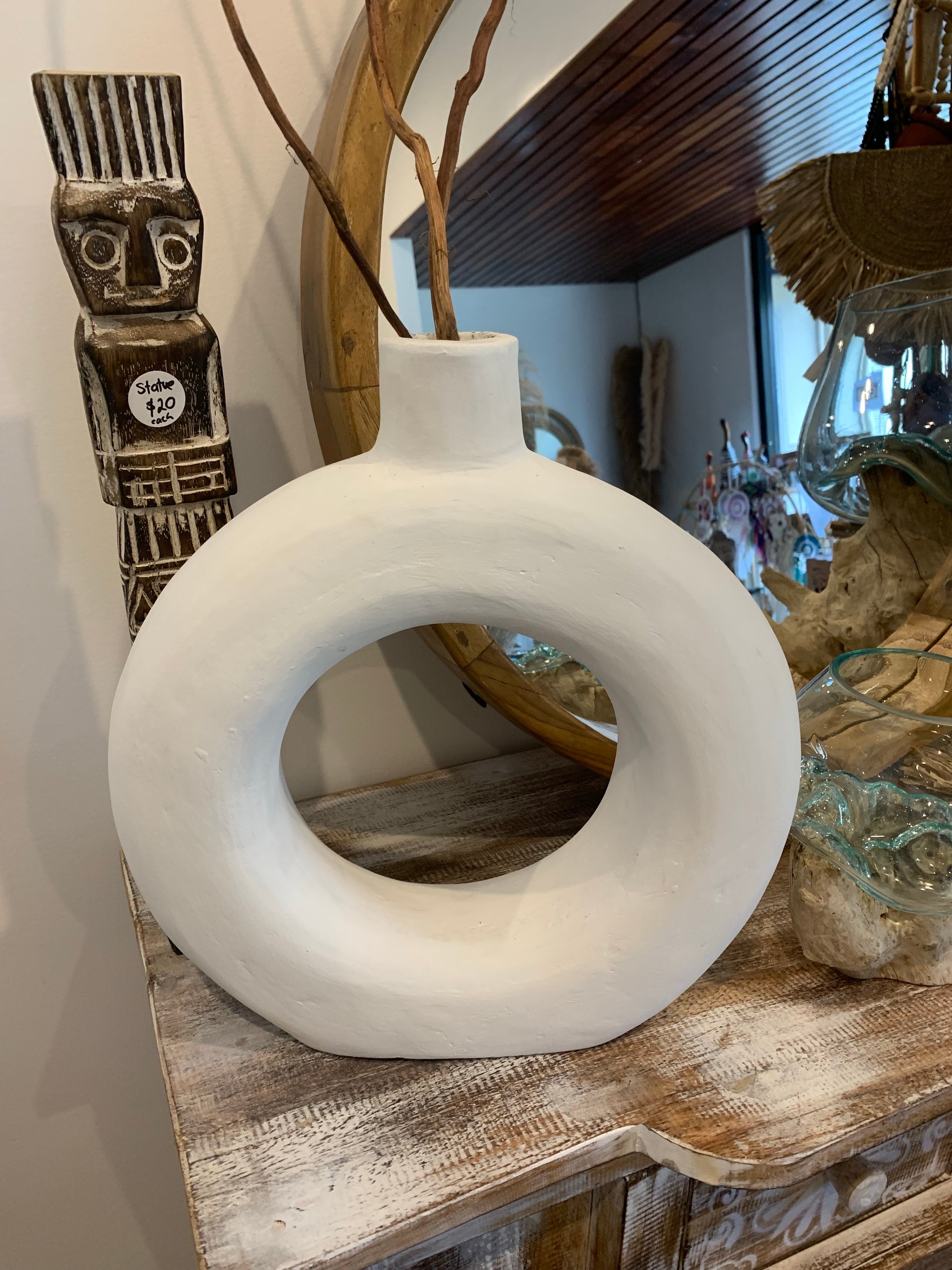 White terracotta donut shape vase