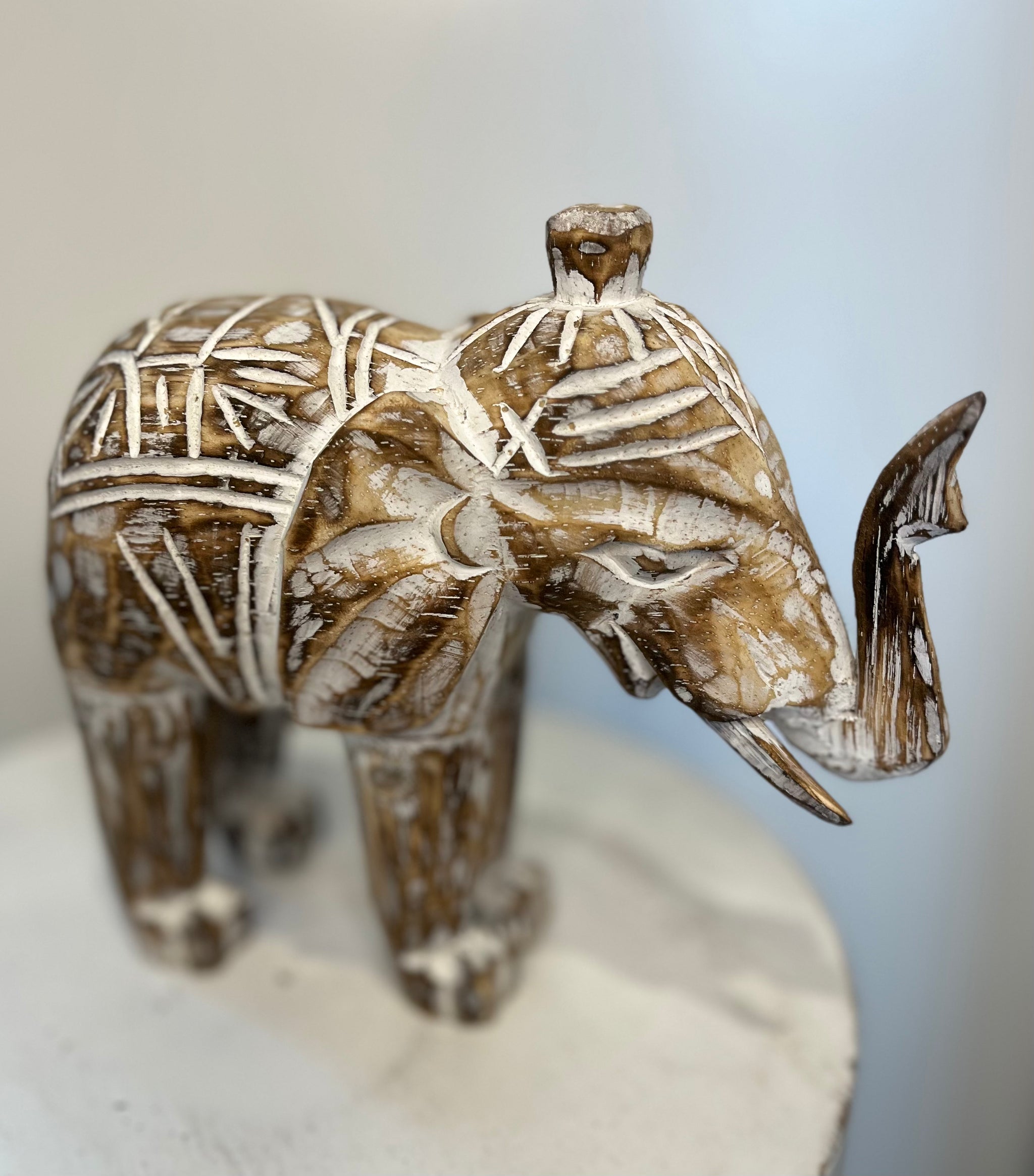 Timber handcarved elephants brown . Small