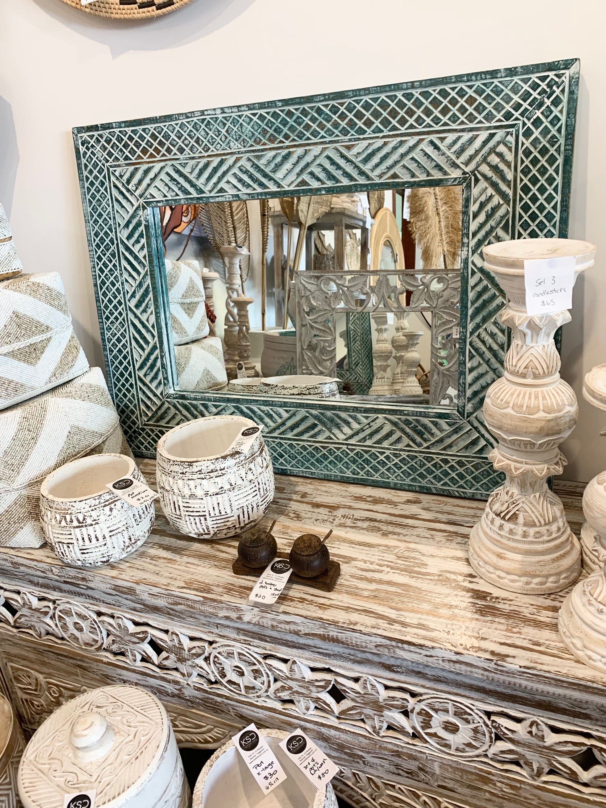 Green carved timber mirror