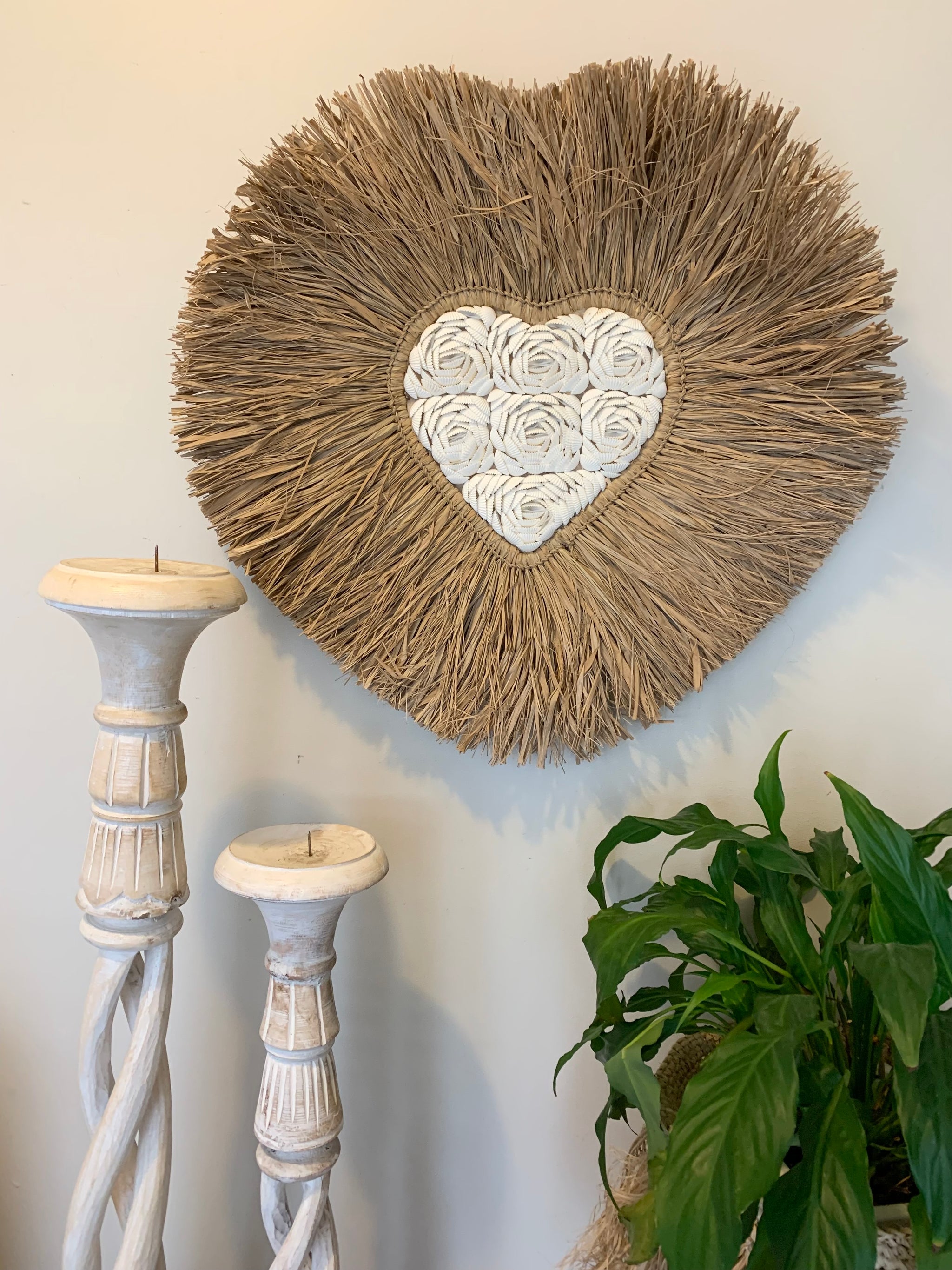 Raffia and shell wall hanging. Heart.